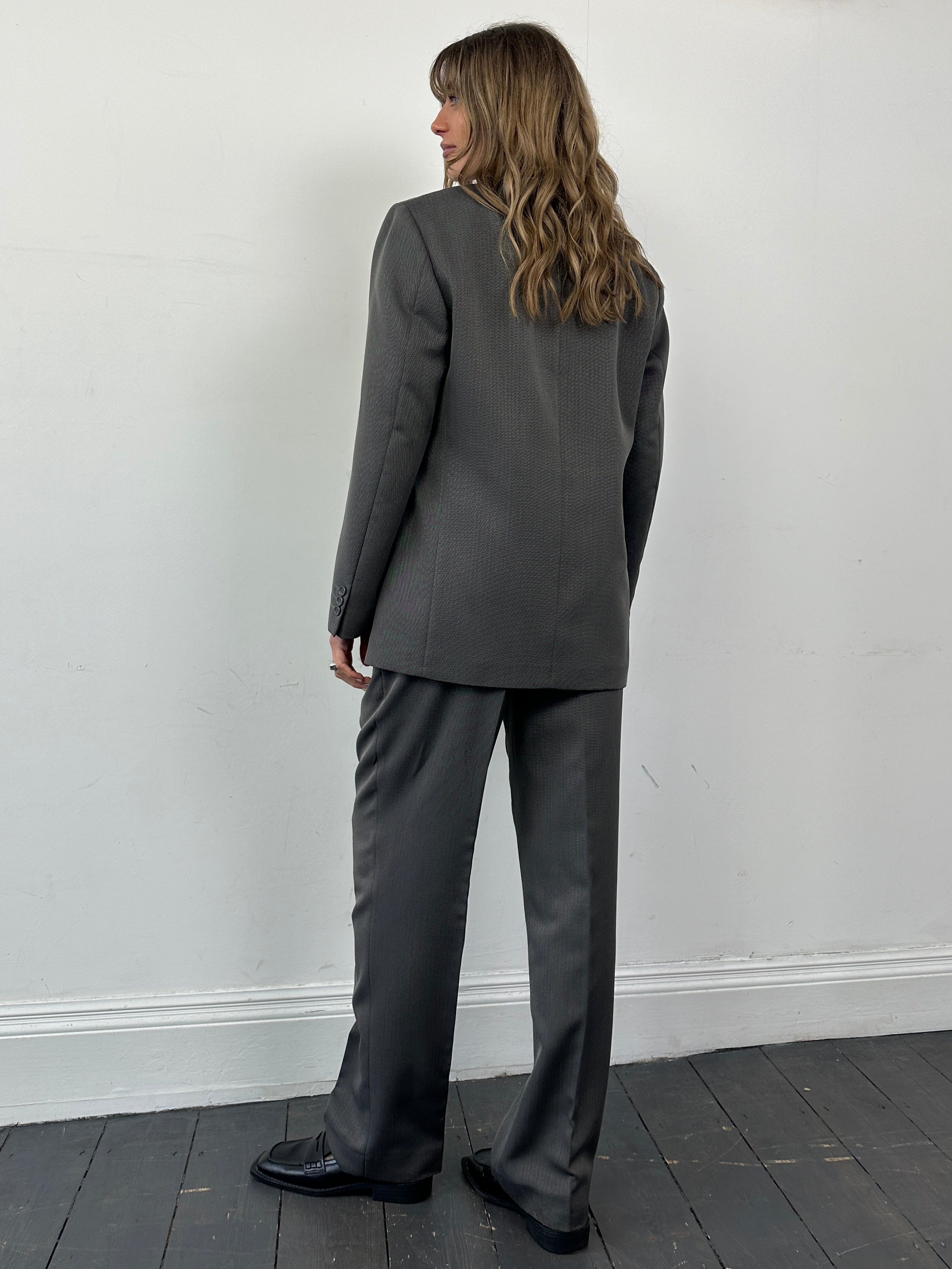 Vintage herringbone single-breasted suit jumpsuit in size 38R/W32, tailored with a classic design and structured fit.