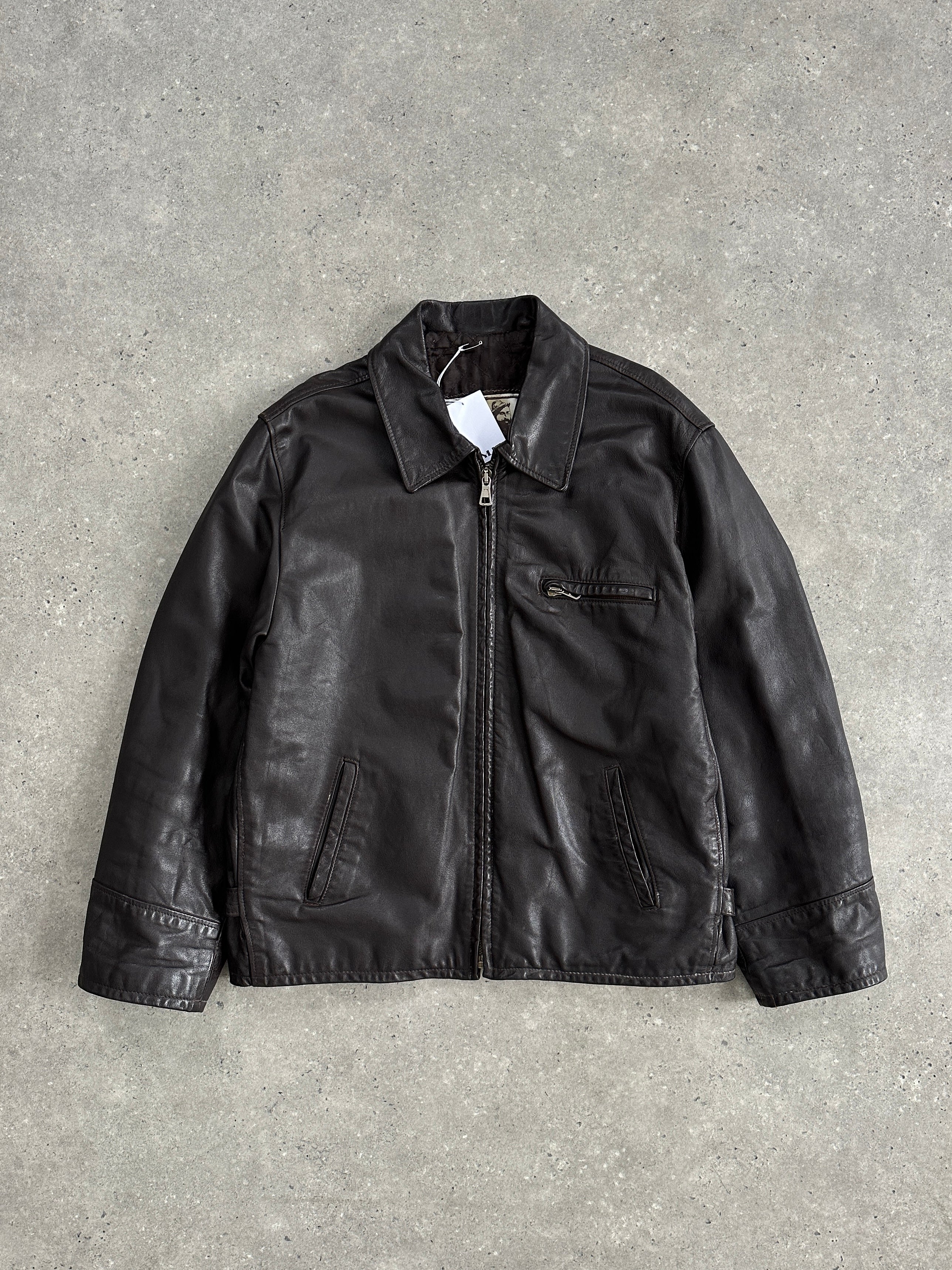 Vintage Italian leather jacket in size L/XL, stylish vintage leather jacket with classic details and textured brown leather.