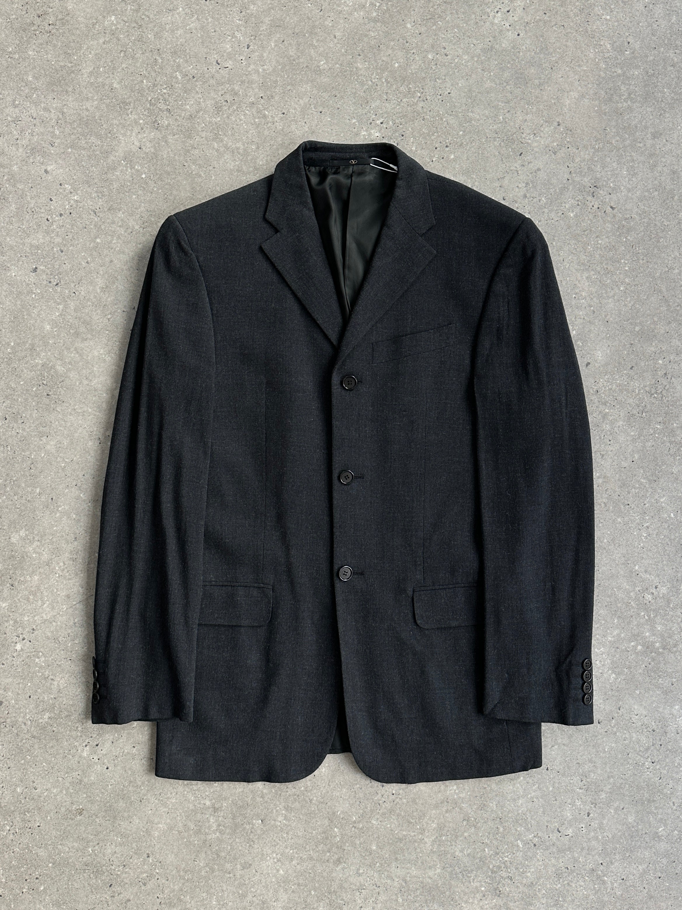 Valentino wool single-breasted blazer in size 36R/M, tailored fit with classic lapels and sleek design.