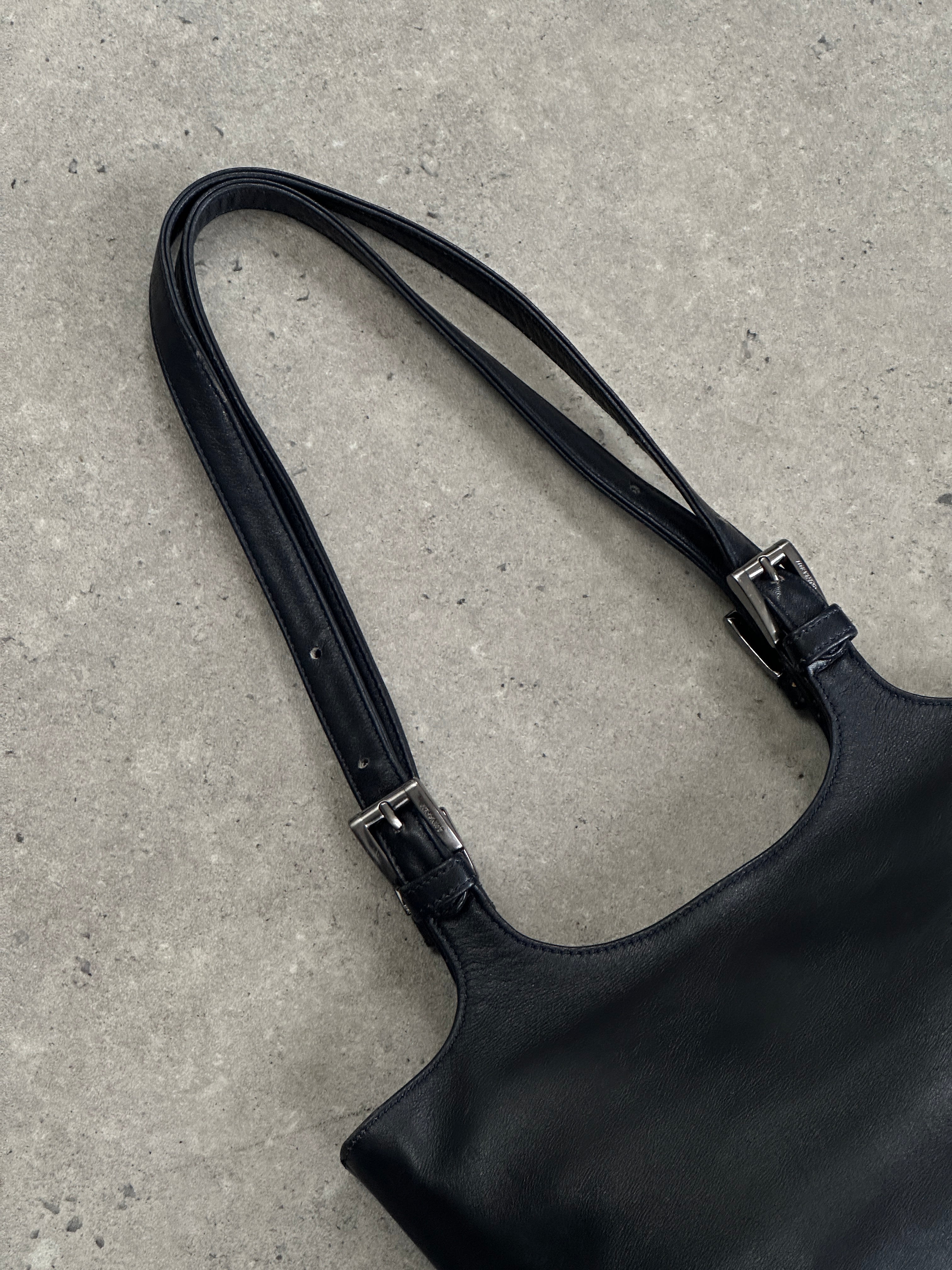 Italian Vintage Leather Buckle Shoulder Bag with adjustable strap, classic design, and antique finish, crafted by Vintage.