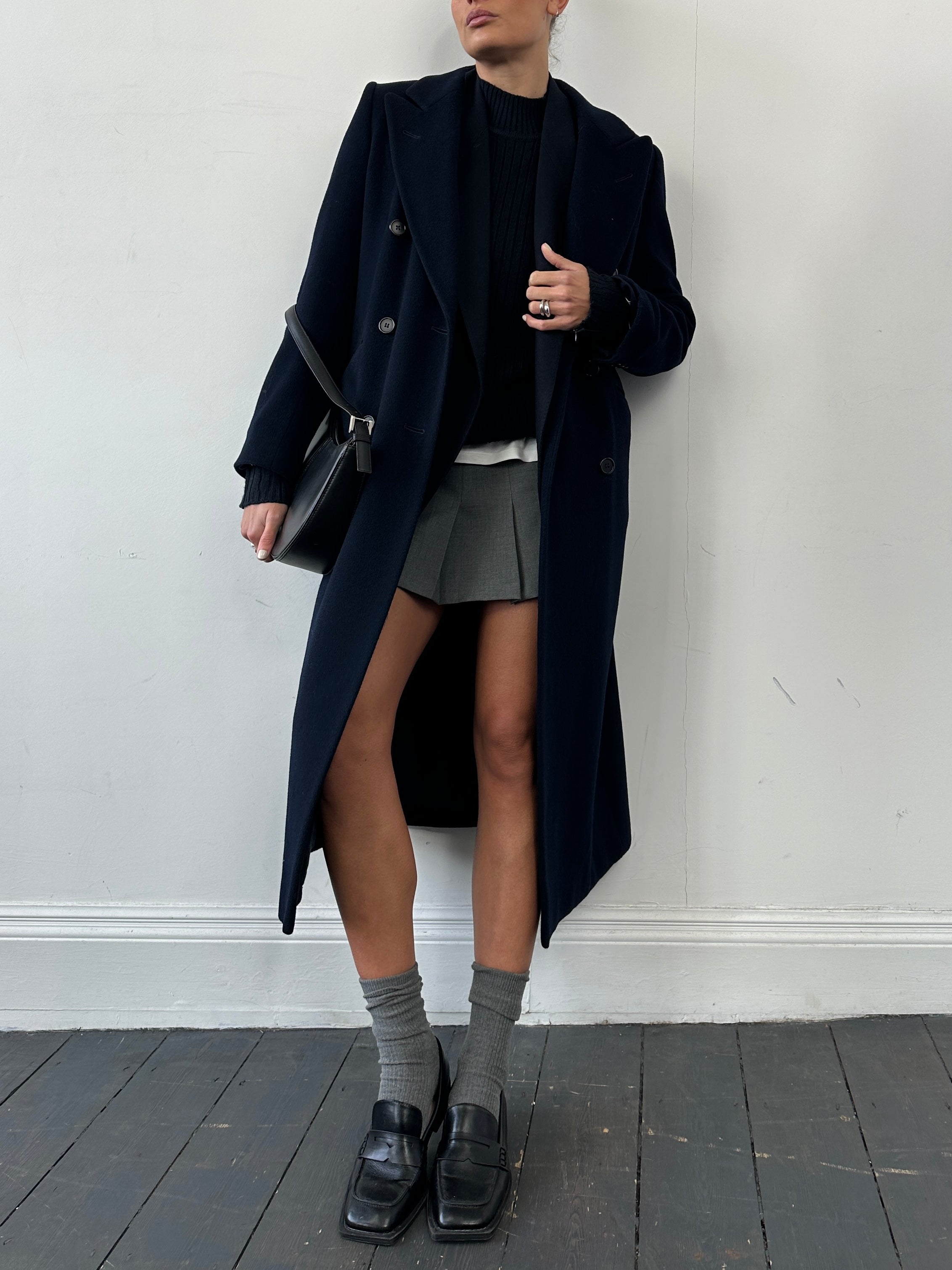 Vintage wool cashmere double-breasted coat in size small, featuring classic tailored design and warm, textured fabric.