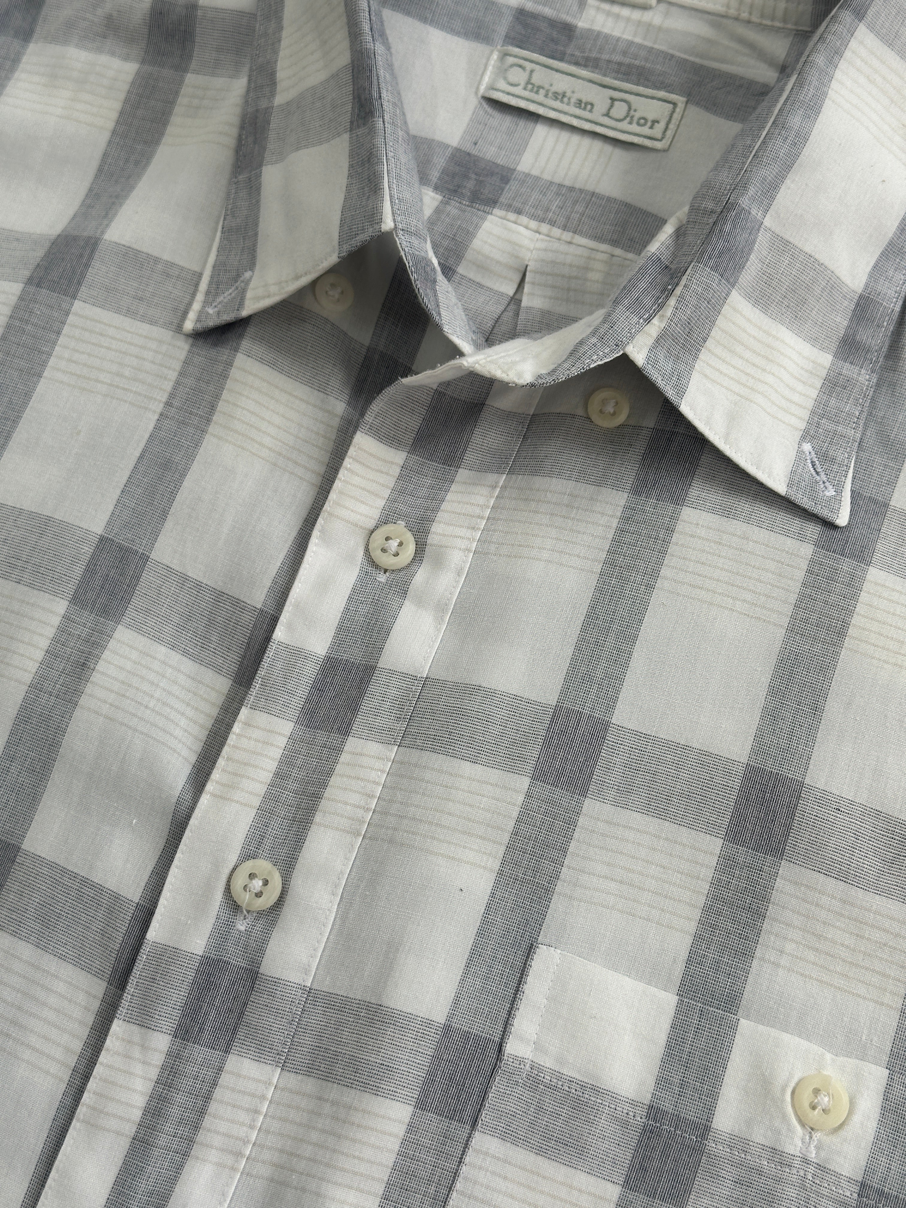 Christian Dior 1990s check cotton shirt in XL, featuring classic pattern and button-down collar, displayed on a hanger.