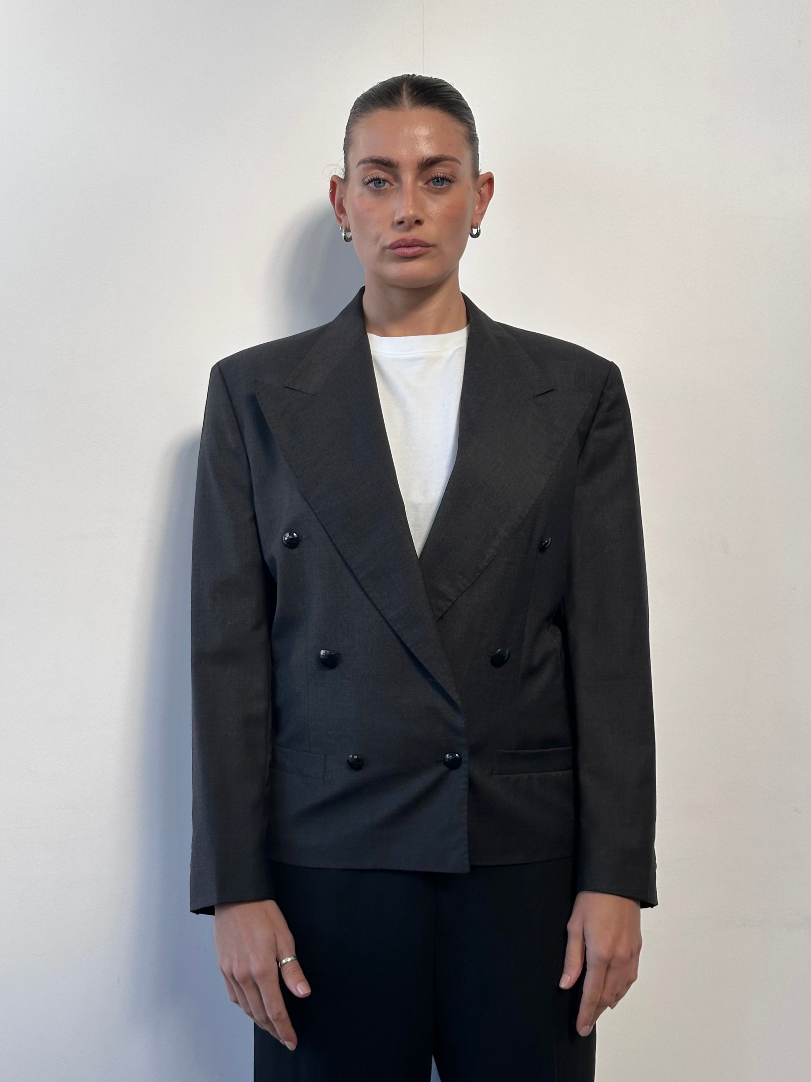Gianni Versace 80s pure wool cropped double-breasted blazer in black, stylish tailored design, size small/medium.