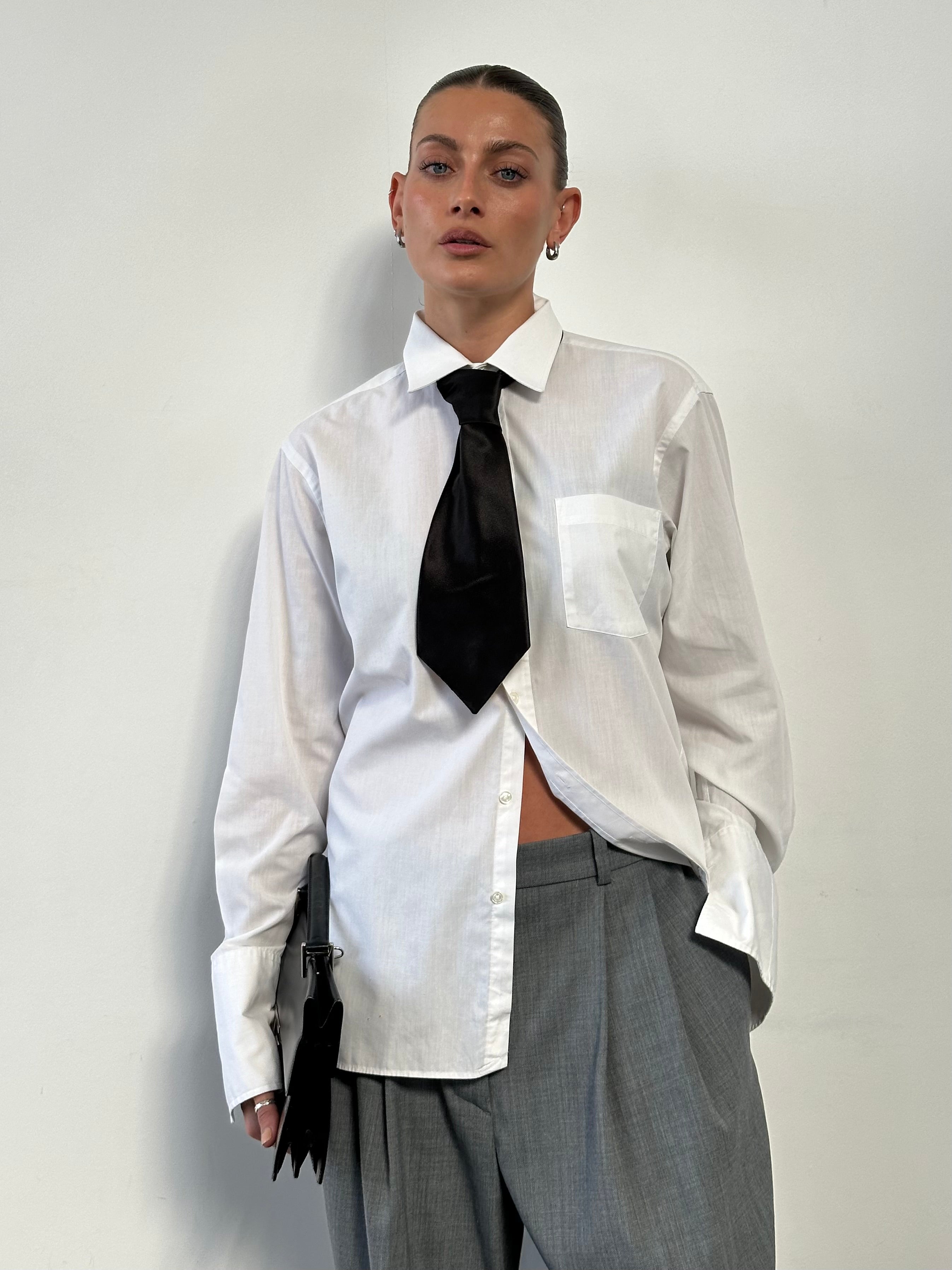 Christian Dior cotton dress shirt in size L, featuring a classic collar and button-down front, elegant and tailored for a refined look.