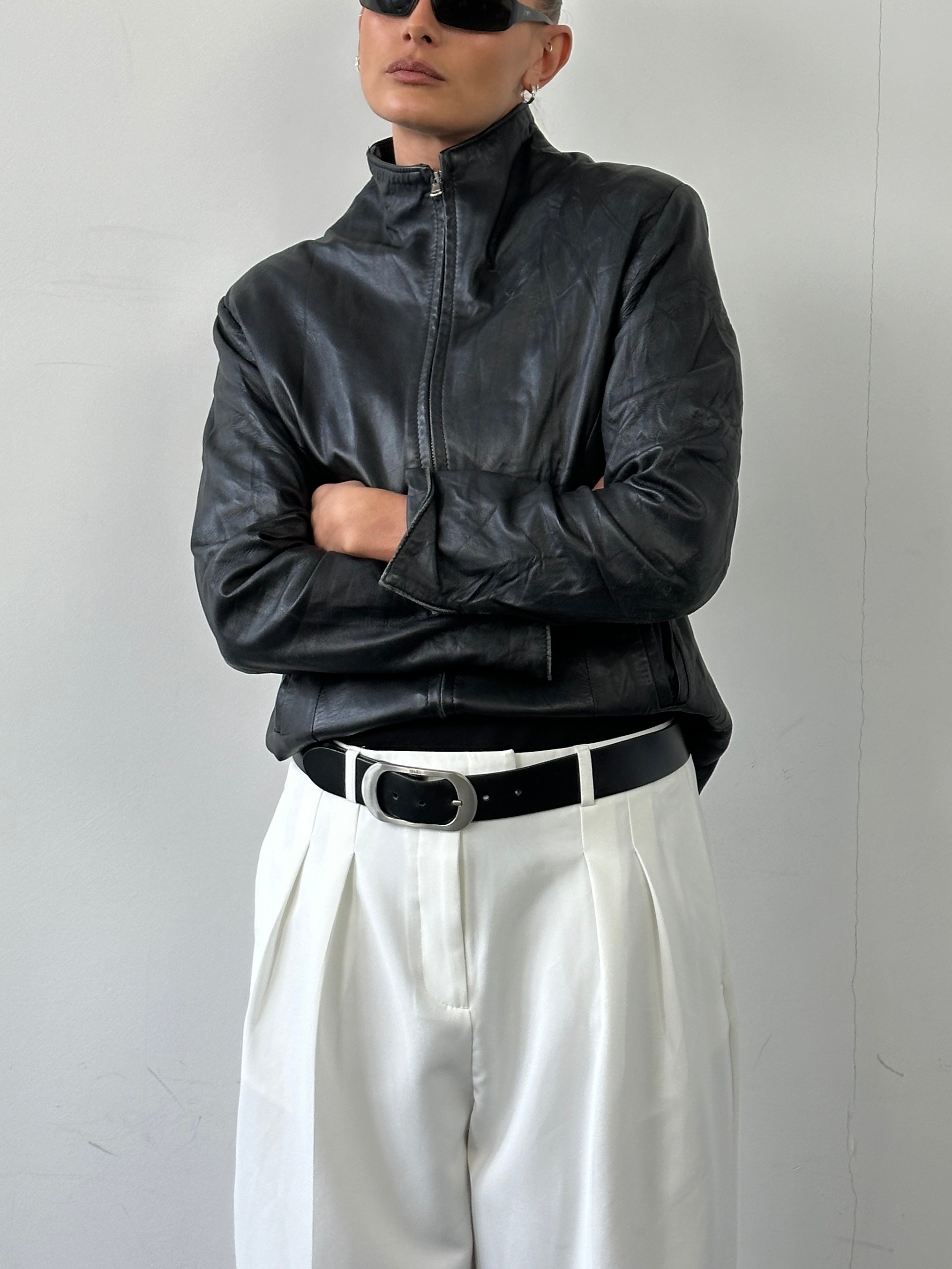 Vintage Italian leather jacket with high neck and double zip front, size S, stylish vintage men's or women's outerwear.