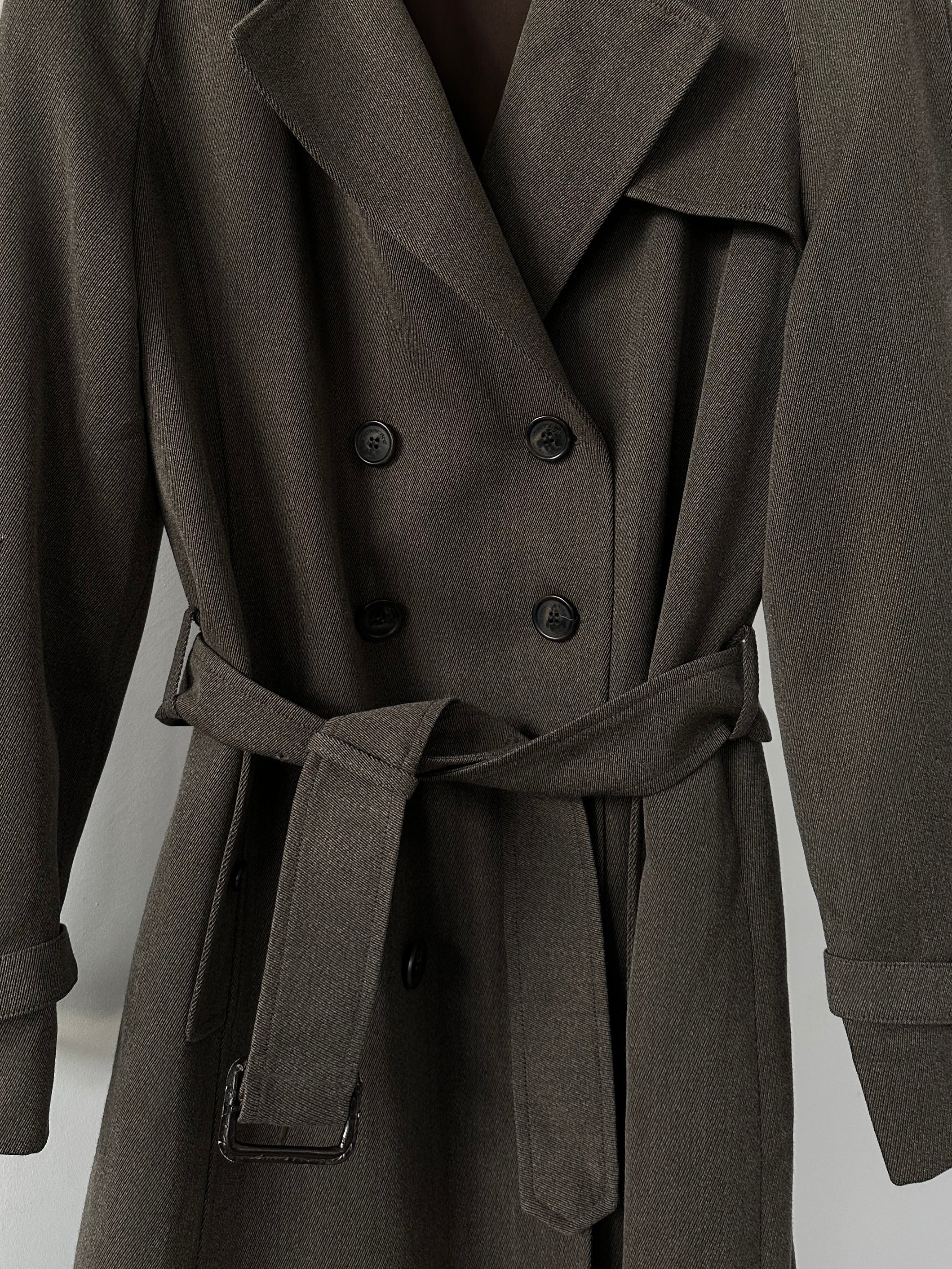 Burberry London wool double-breasted belted trench coat in size M, classic beige color, displayed on a hanger.