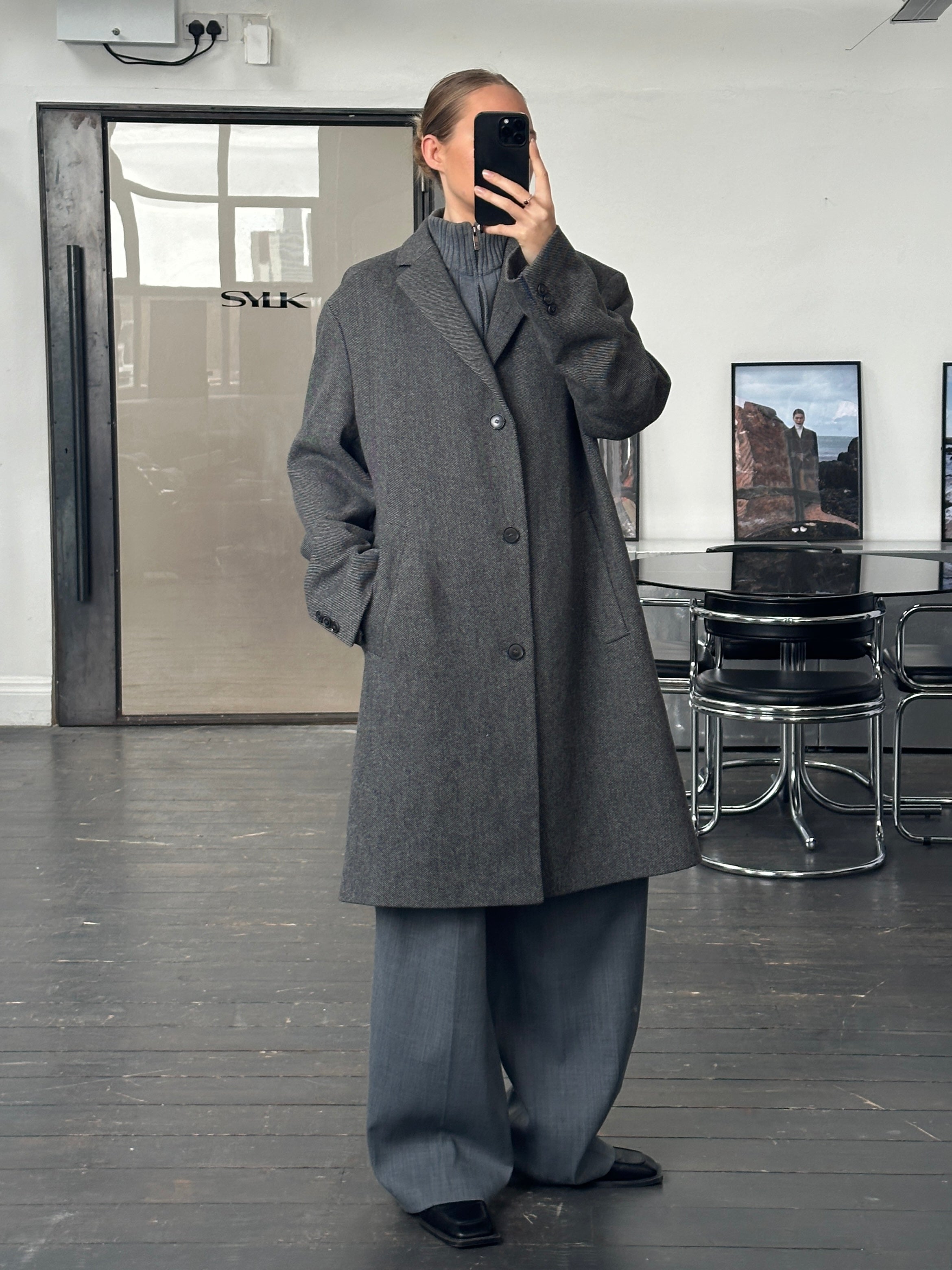 Hugo Boss 1990s wool single-breasted coat in XXL, classic dark color, tailored fit, and stylish design.
