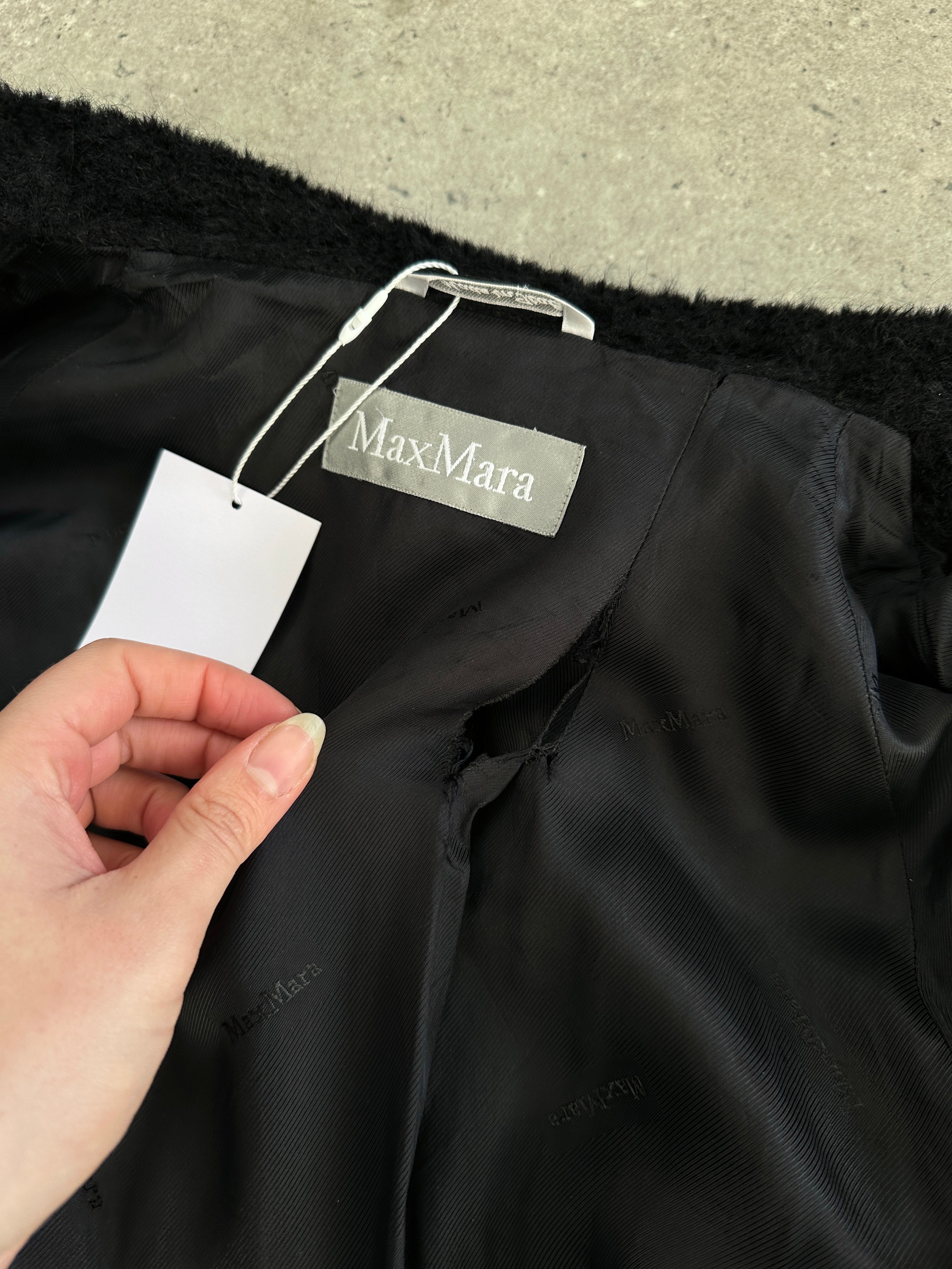Max Mara Teddy alpaca wool coat in S/M, showcasing its soft, plush fabric and stylish design.