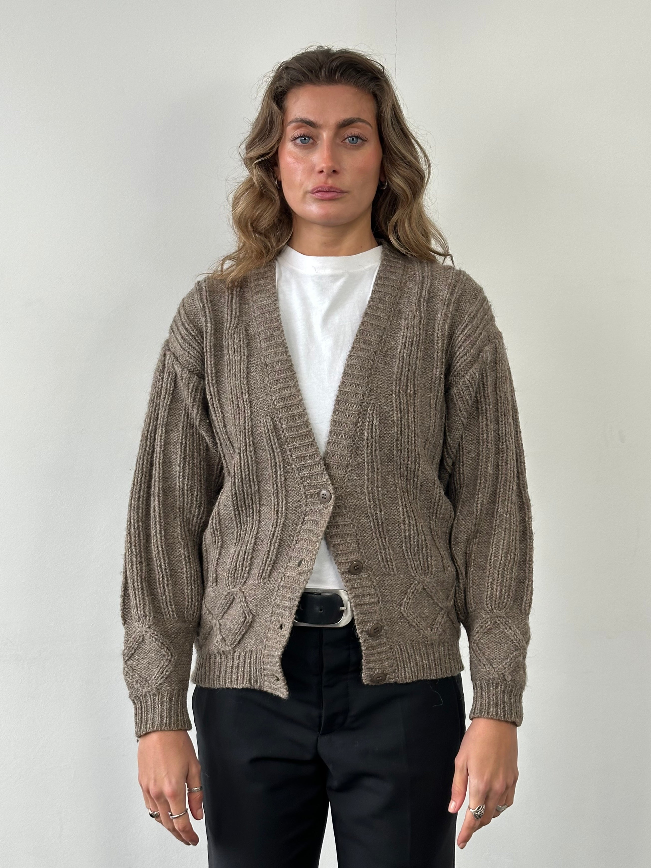 Kenzo pure wool chunky cable knit cardigan in black, featuring thick cable patterns and a relaxed fit, S/M size.