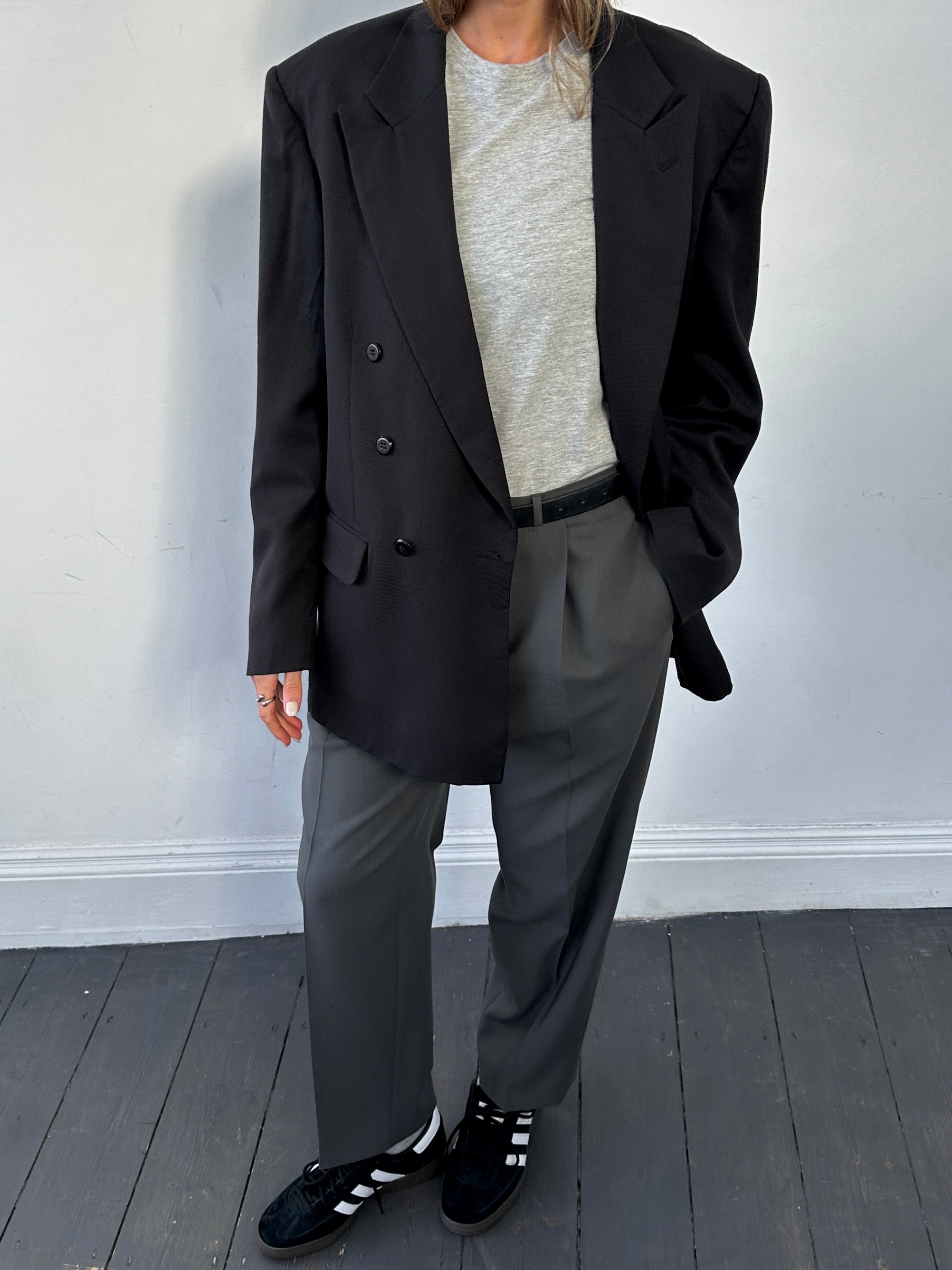 Vintage wool double-breasted blazer in size 40L, stylish and tailored, featuring classic design and button details.