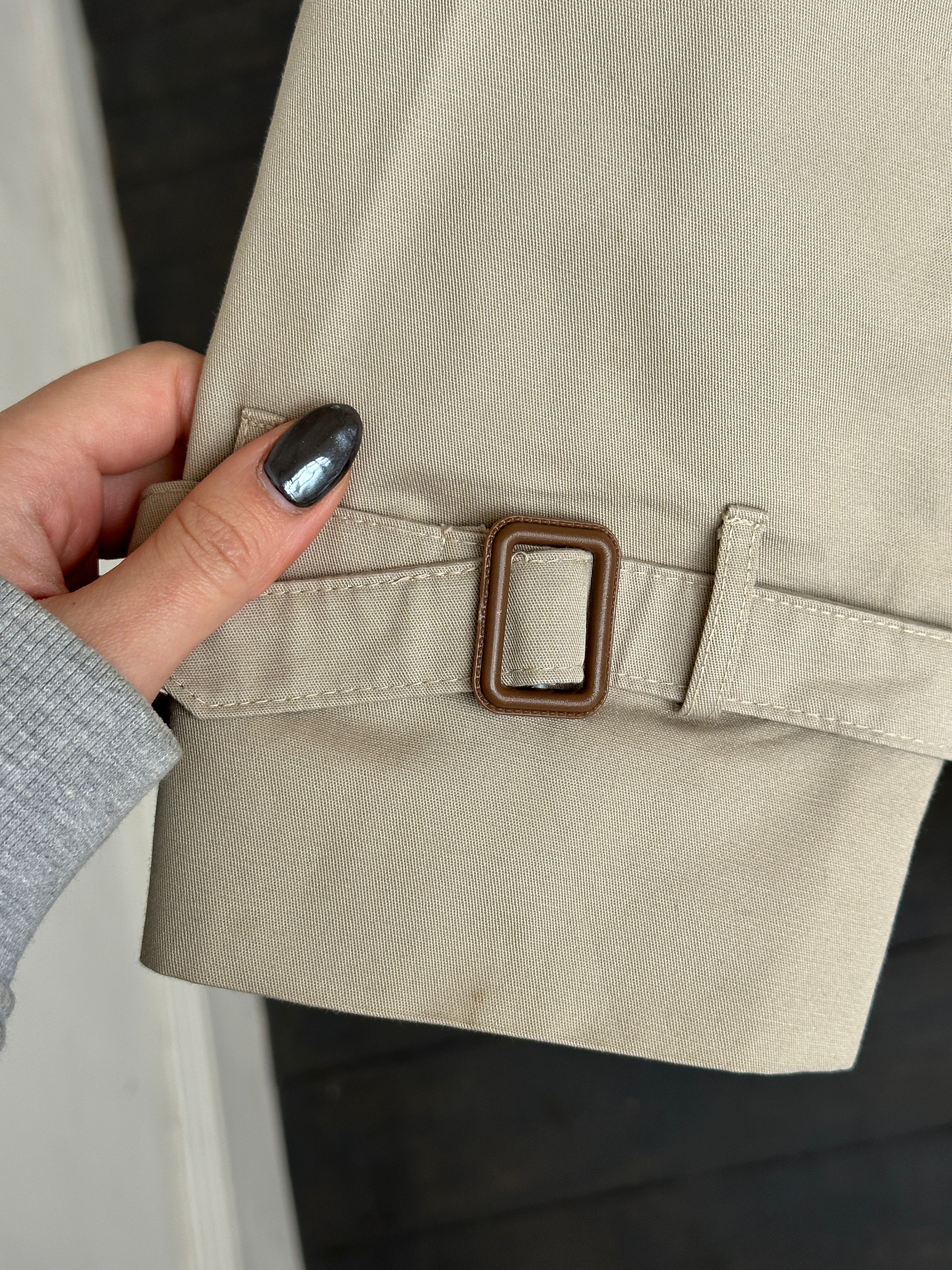Christian Dior double-breasted belted trench coat in XL, beige fabric with classic collar and button details.