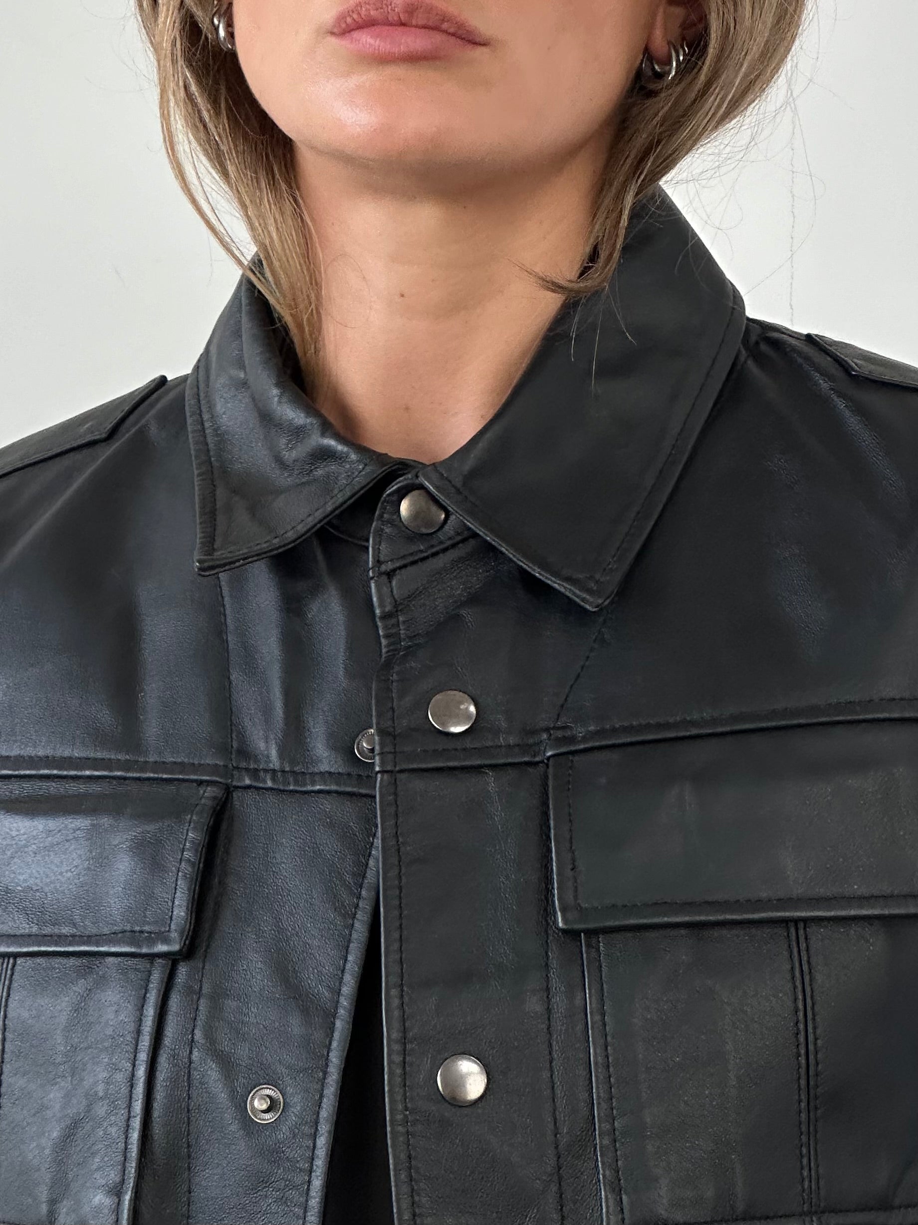 Vintage Conbipel leather jacket in size M, featuring classic vintage style with detailed stitching and a sleek leather finish.