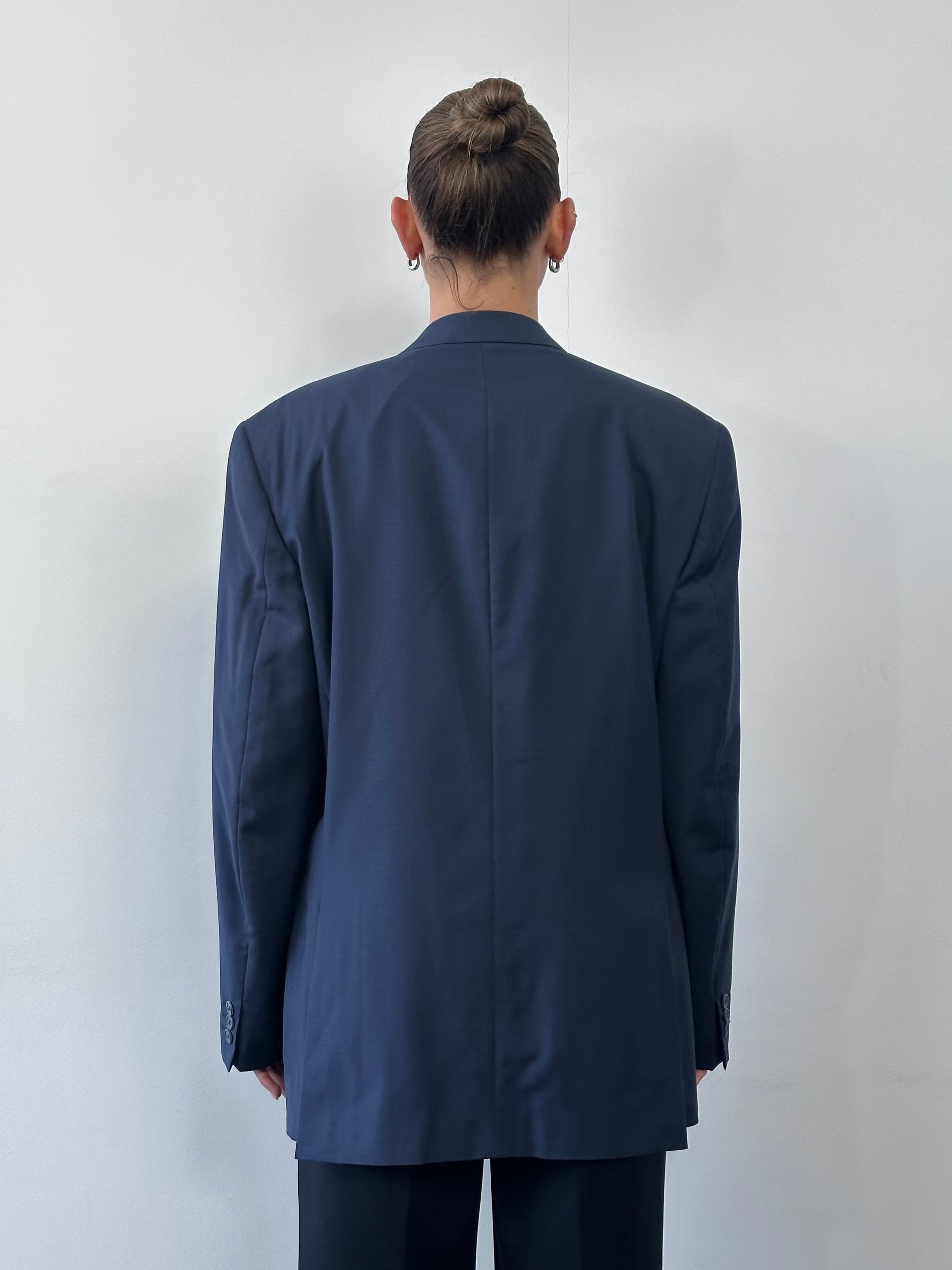 Vintage Italian 1990s double-breasted blazer in pure Tasmanian wool, size 42R/XL, featuring classic tailored design.