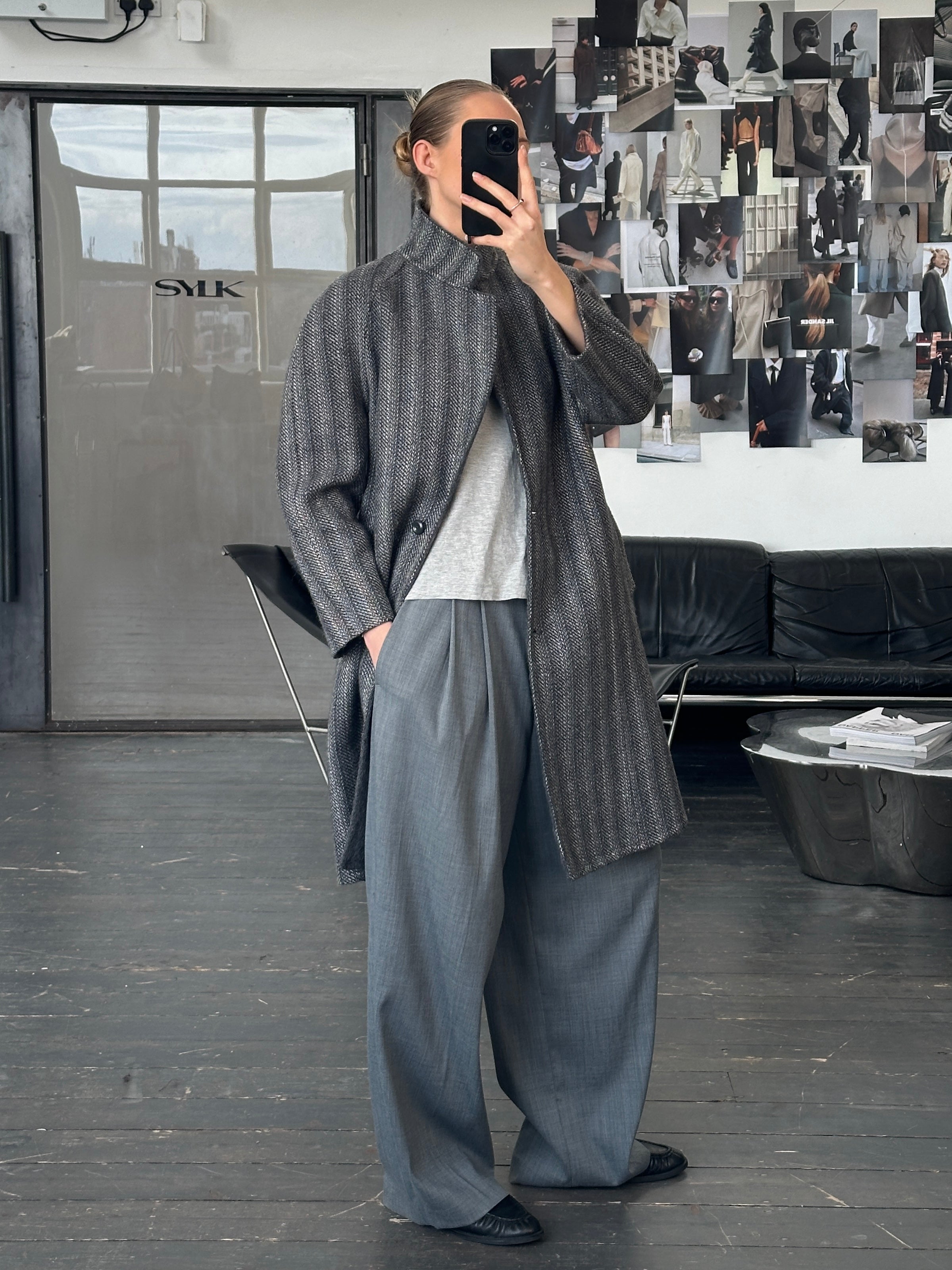 Marina Rinaldi 1990s pure wool double-faced single-breasted coat in size S, tailored with classic collar and button closure.