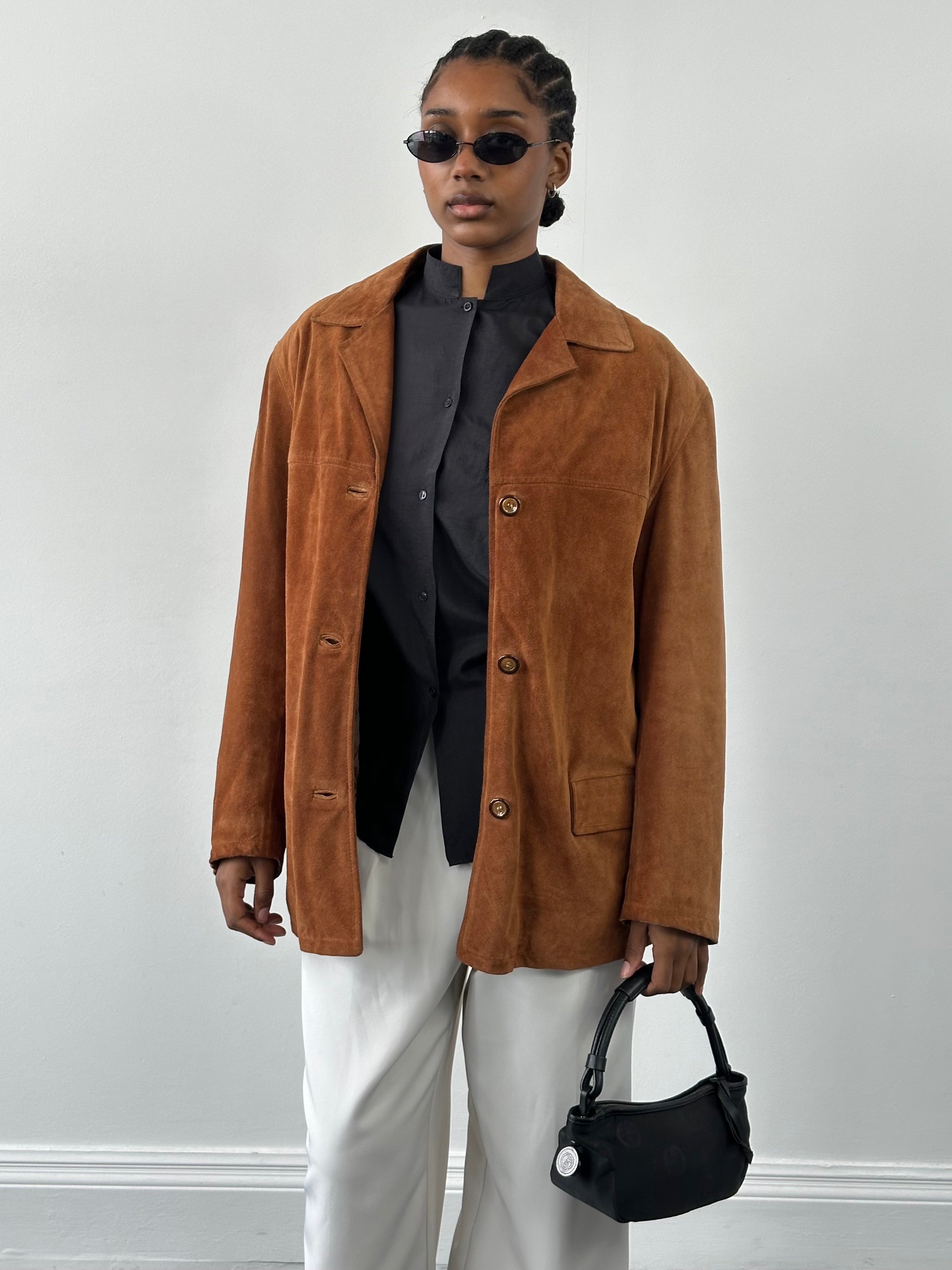 Vintage Italian 1990s suede leather jacket in size large, stylish retro outerwear with textured suede finish.