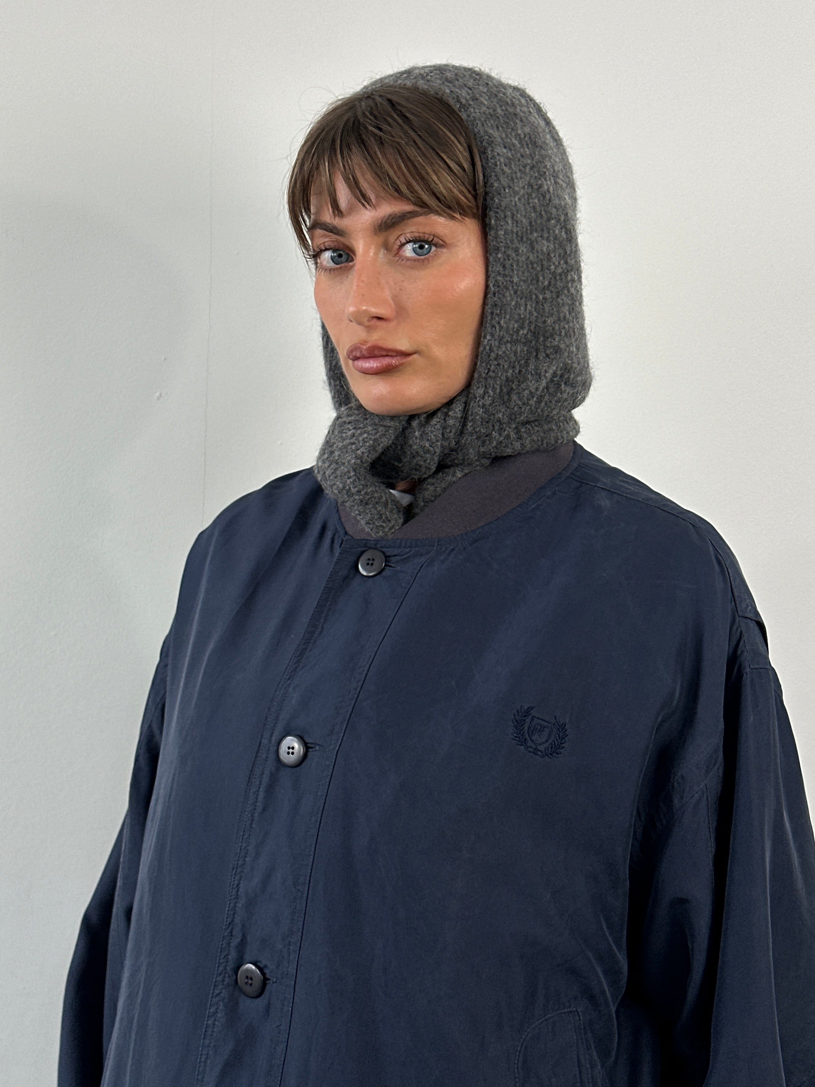 Vintage 1990s pure silk bomber jacket in size large, featuring a classic design and smooth silk fabric.