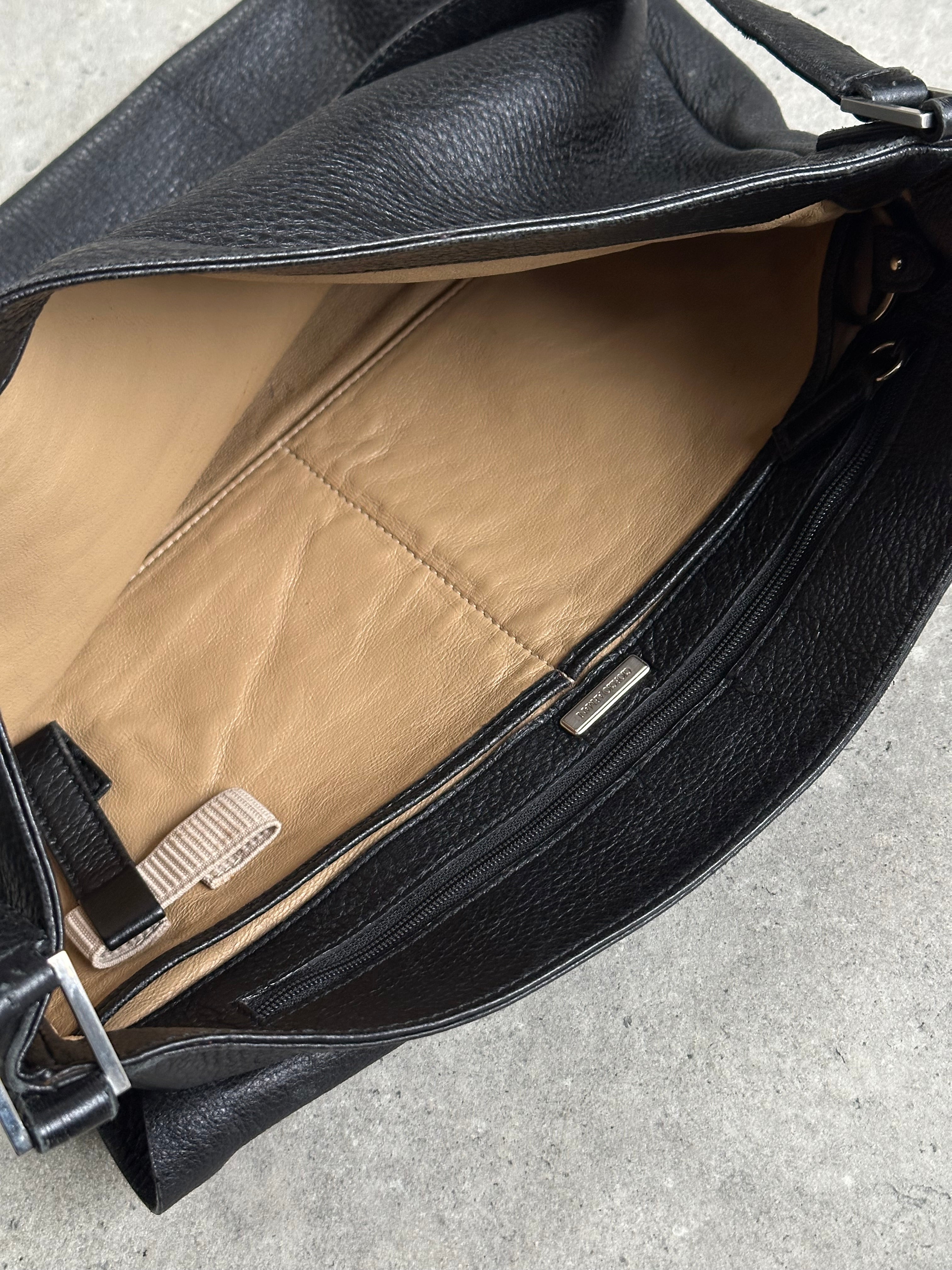 Giorgio Armani 2000s leather crossbody bag with sleek design, featuring a structured shape and adjustable strap.