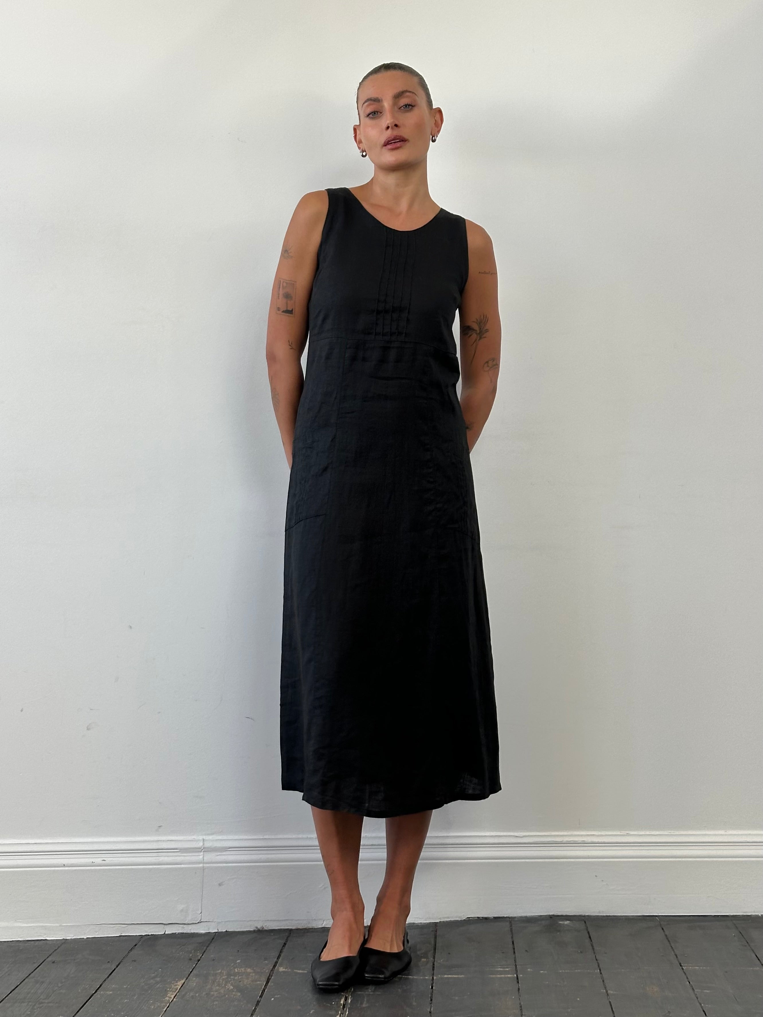 Vintage pure linen maxi dress in size small, featuring a flowing silhouette and classic design, perfect for casual or summer wear.