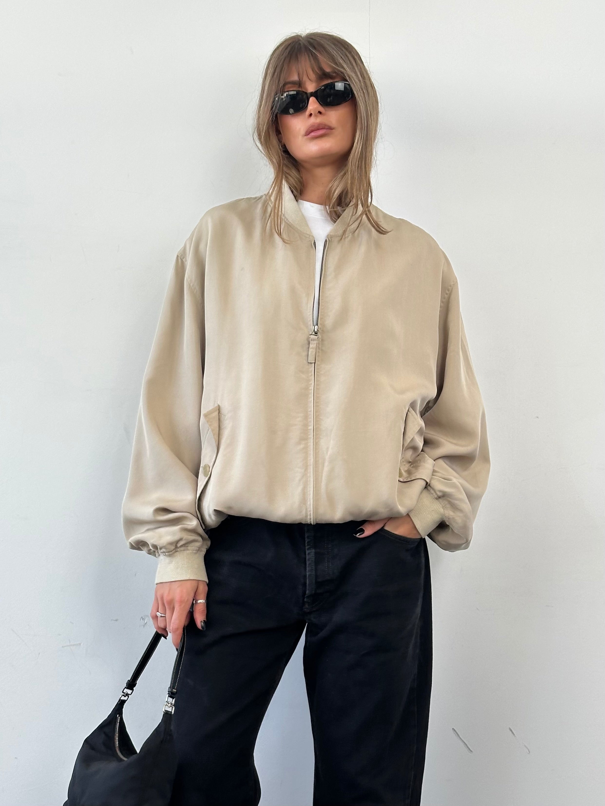 Vintage pure silk bomber jacket in XL, featuring a classic design with a smooth, shiny finish and ribbed collar and cuffs.