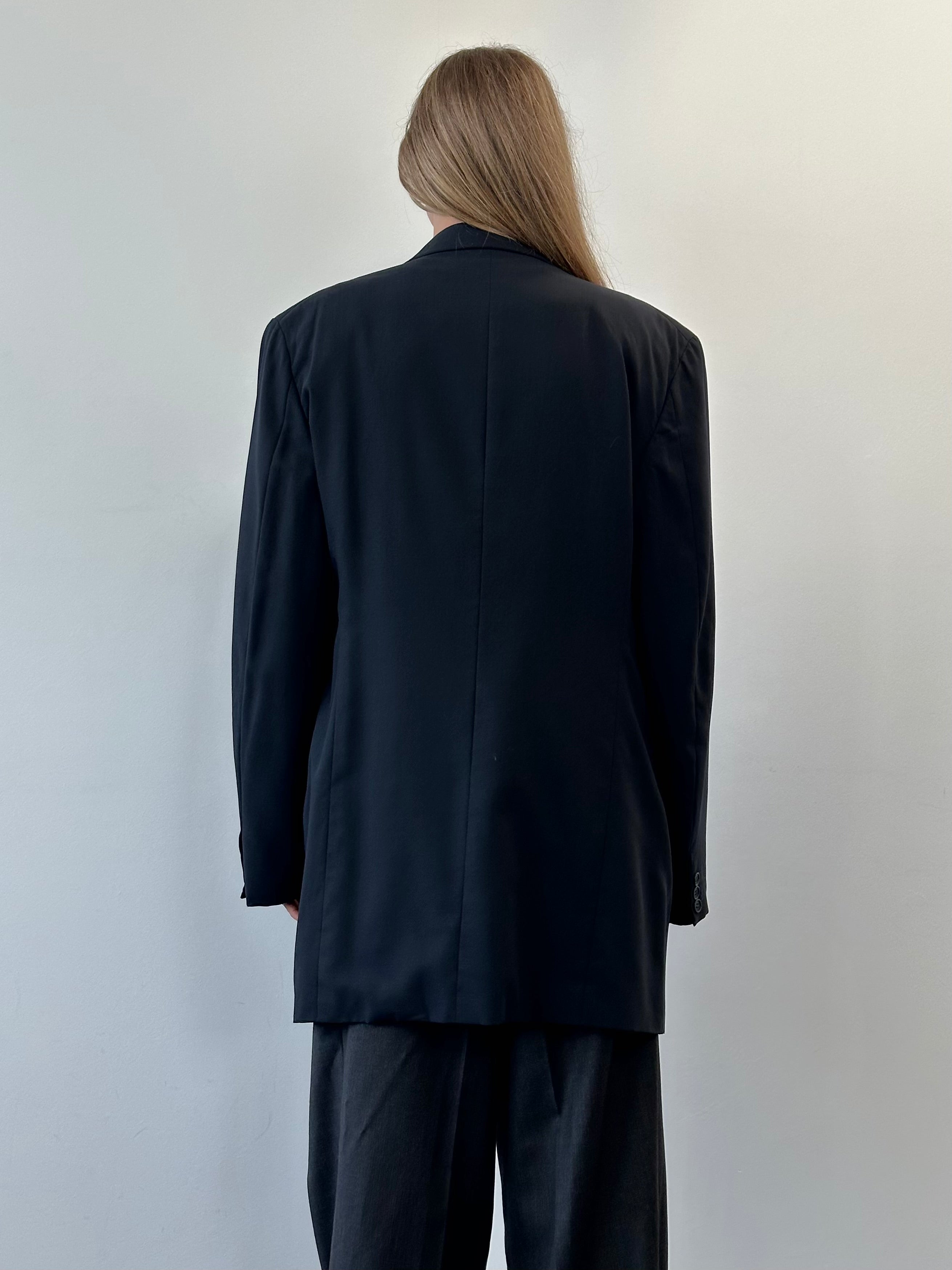 Emporio Armani pure wool single-breasted blazer in size XL, tailored fit with classic lapel and front button closure.