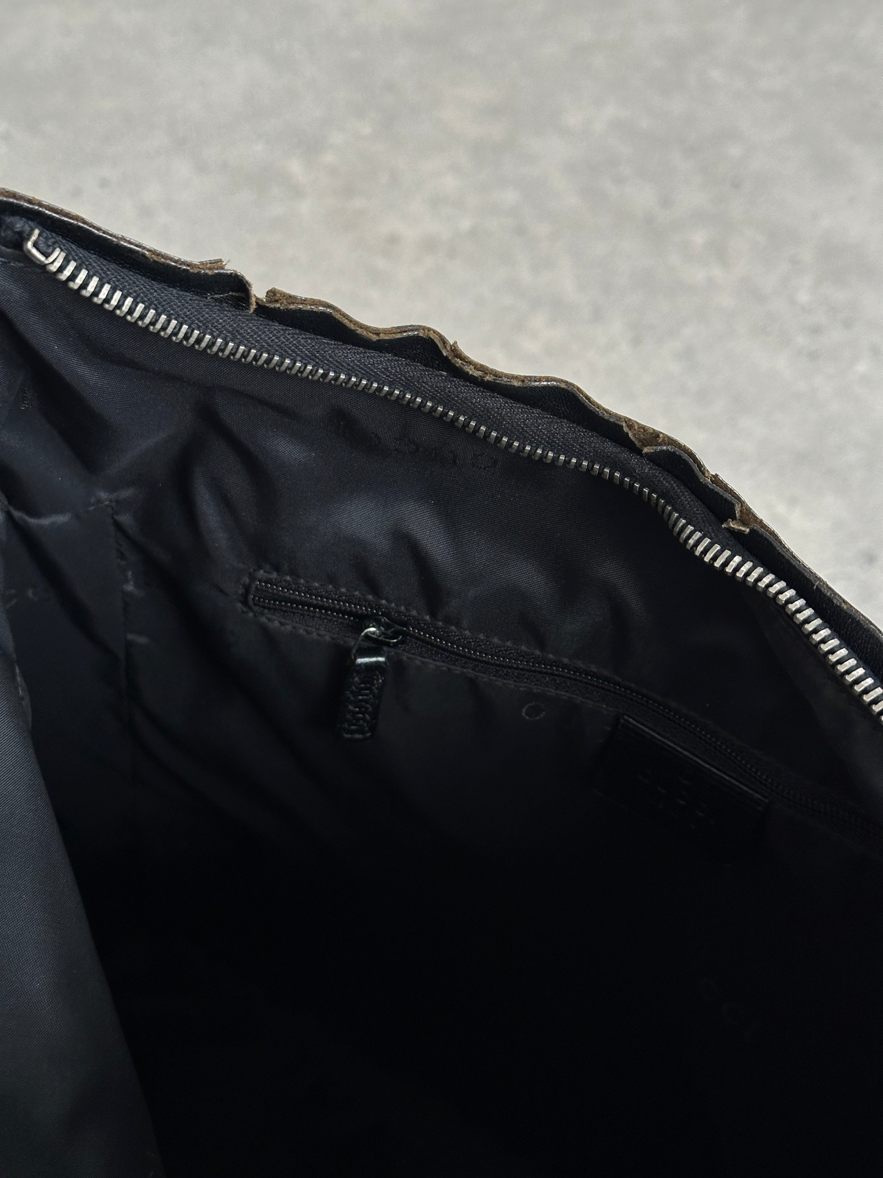Gucci 1990s Tom Ford canvas and leather hobo shoulder bag with stylish design and spacious interior.