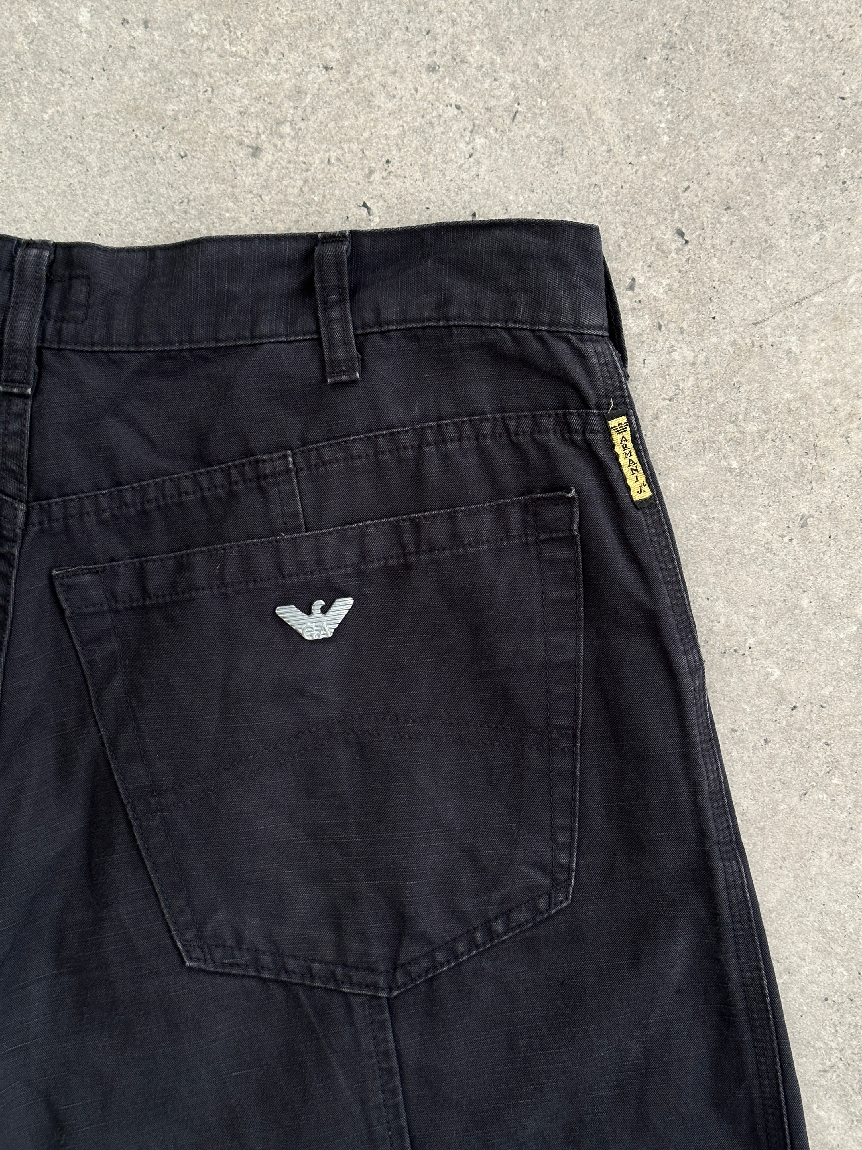 Armani Jeans wide-leg cotton trousers in W32, featuring a relaxed fit and classic style, shown on a plain background.