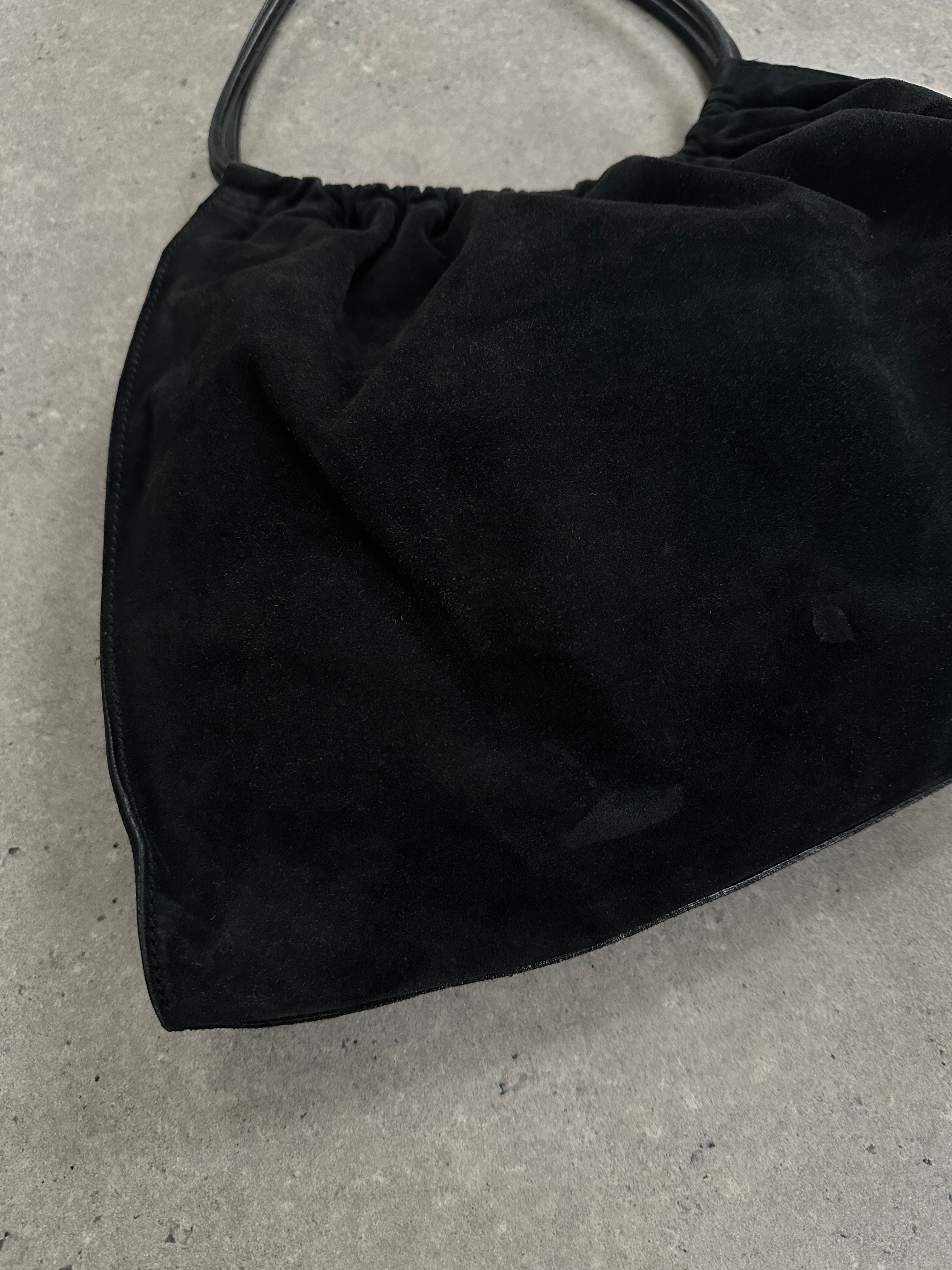 Gucci 1990s Tom Ford suede leather hobo shoulder bag with slouchy design and shoulder strap.