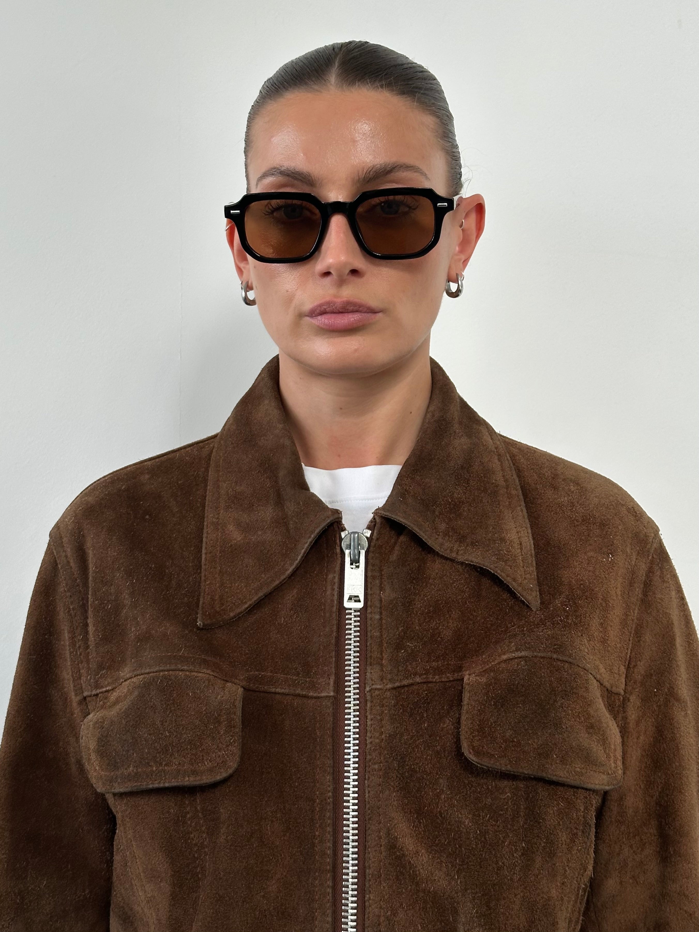 Vintage suede jacket with dagger collar style in size large, featuring a classic vintage design and soft textured suede fabric.