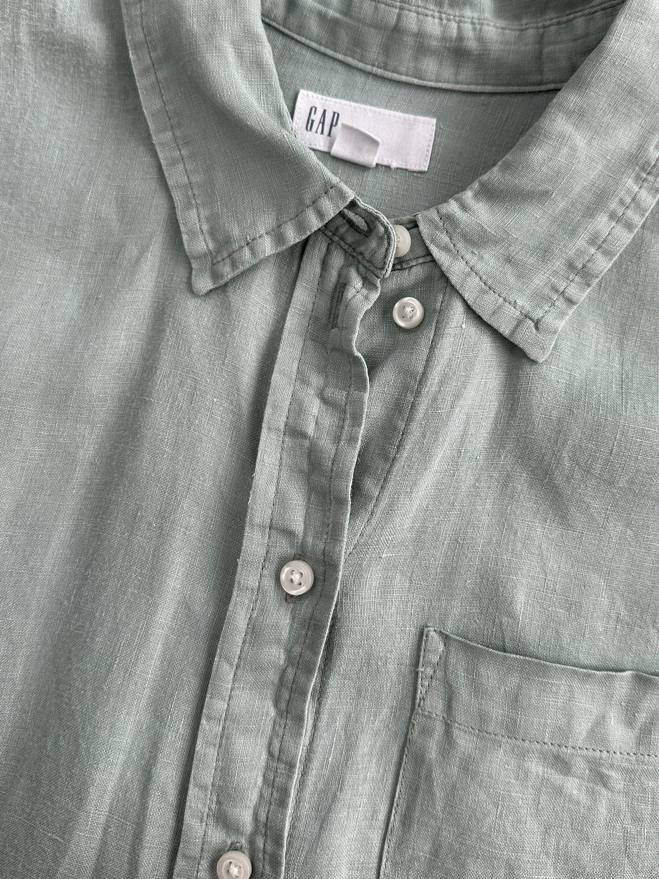 Gap relaxed pure linen shirt in size large, featuring a lightweight, breathable fabric and classic fit, shown on a hanger.