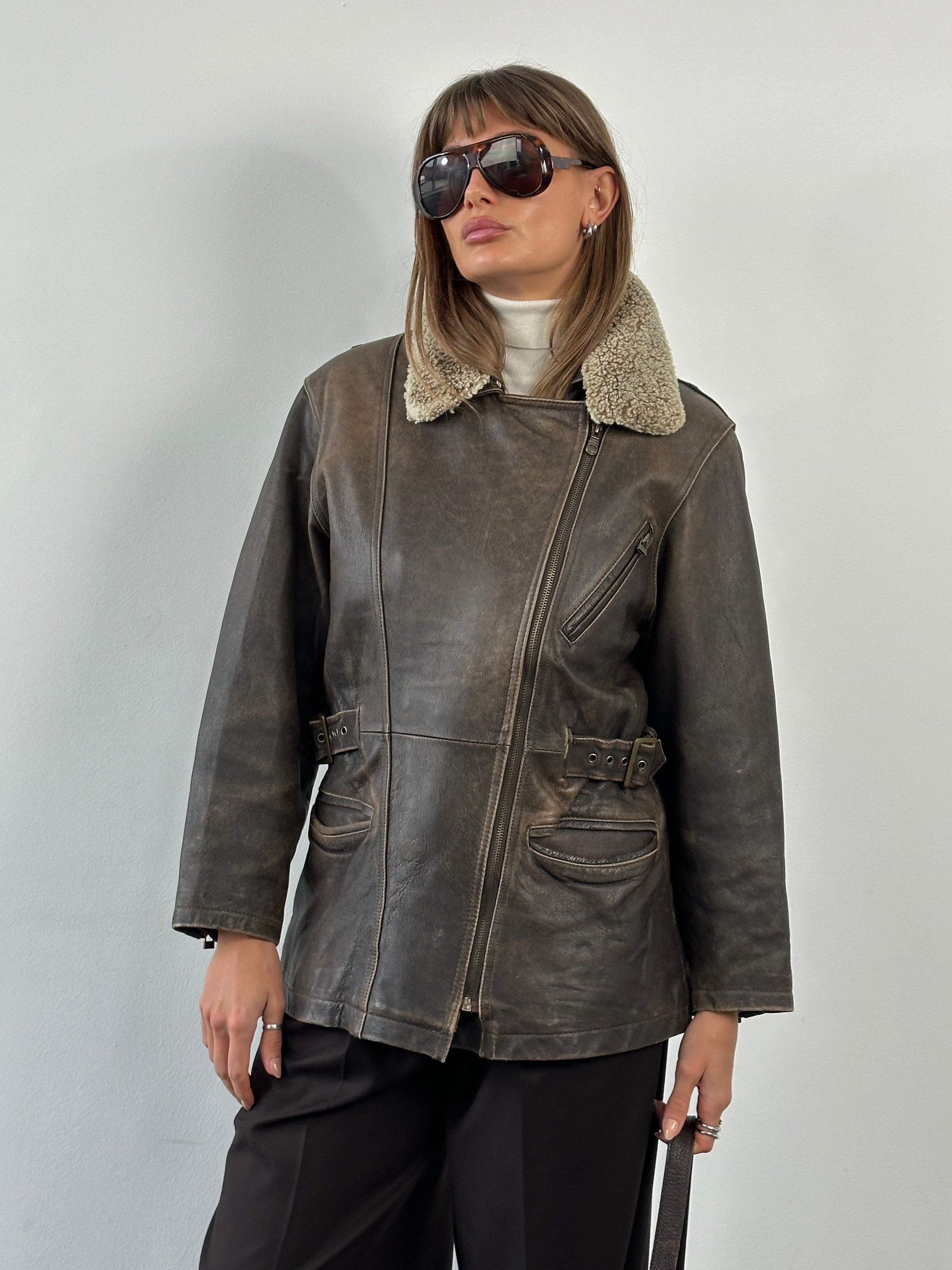 Vintage 1990s aged aviator leather jacket, size M, with distressed brown leather and classic collar detail.