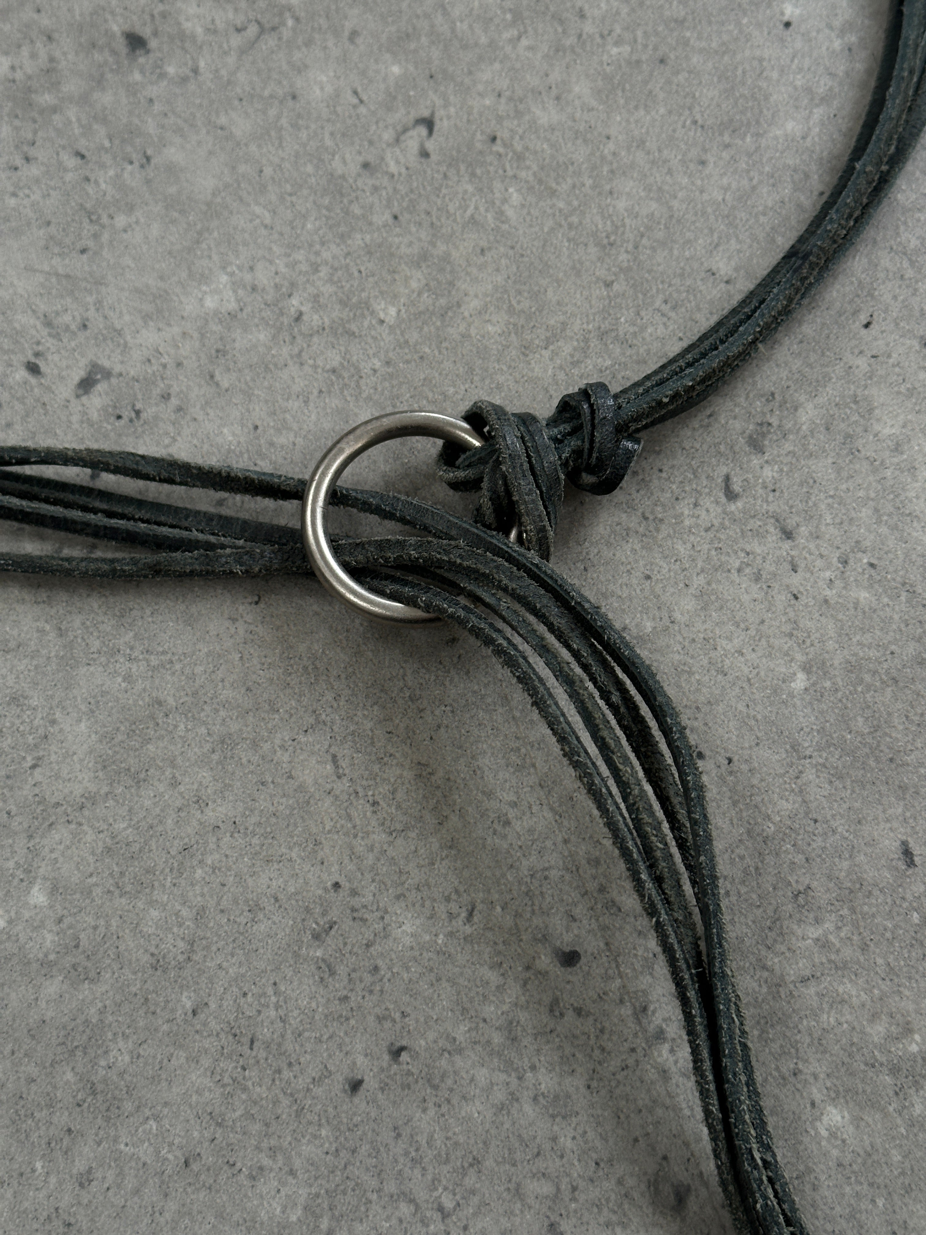 Vintage 1990s leather rope tassel belt with one size, featuring rustic leather and decorative tassels for a retro accessory look.