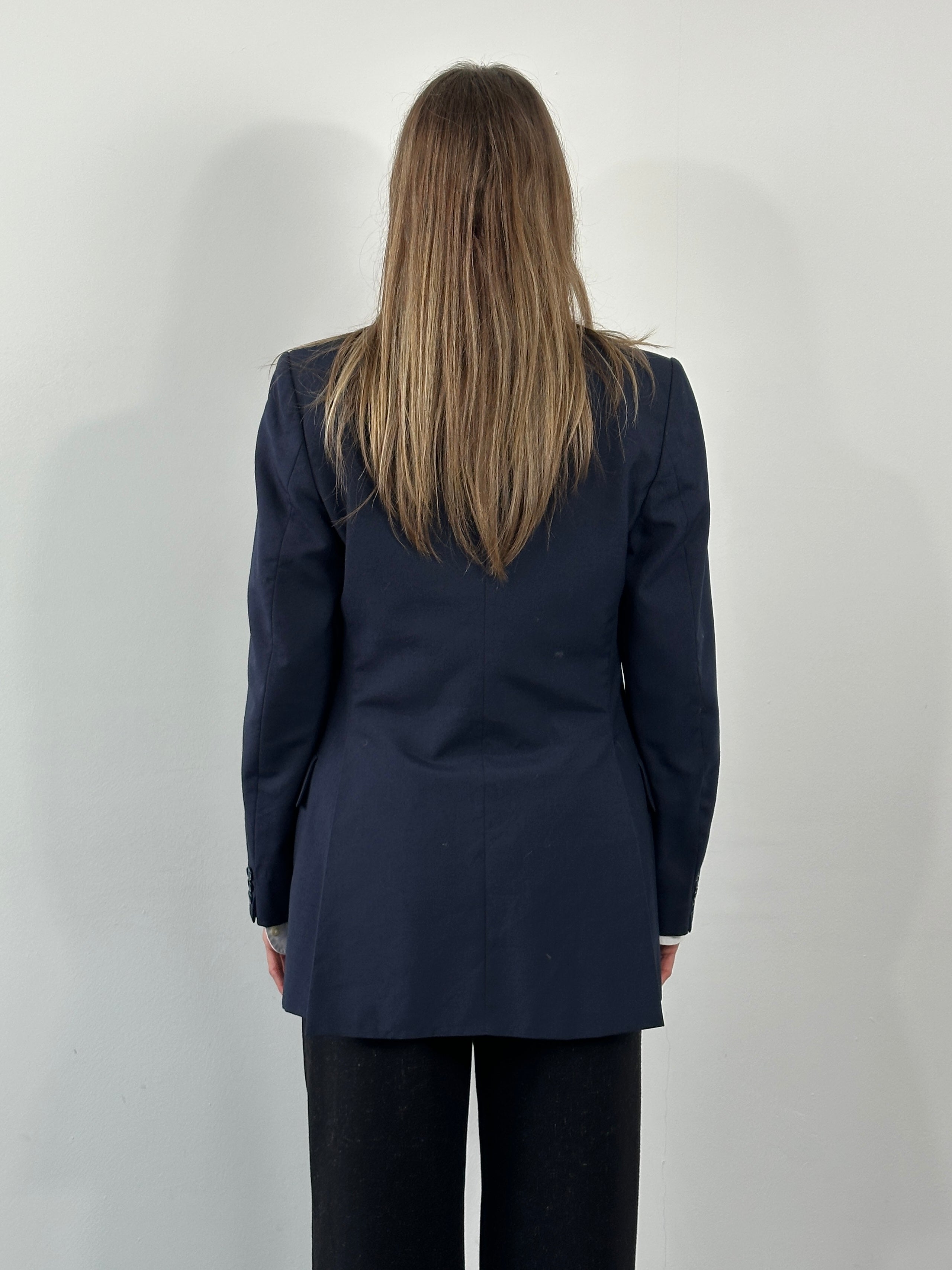 Yves Saint Laurent 1990s pure wool single-breasted blazer in size 36R/S, tailored fit with classic lapel and button closure.