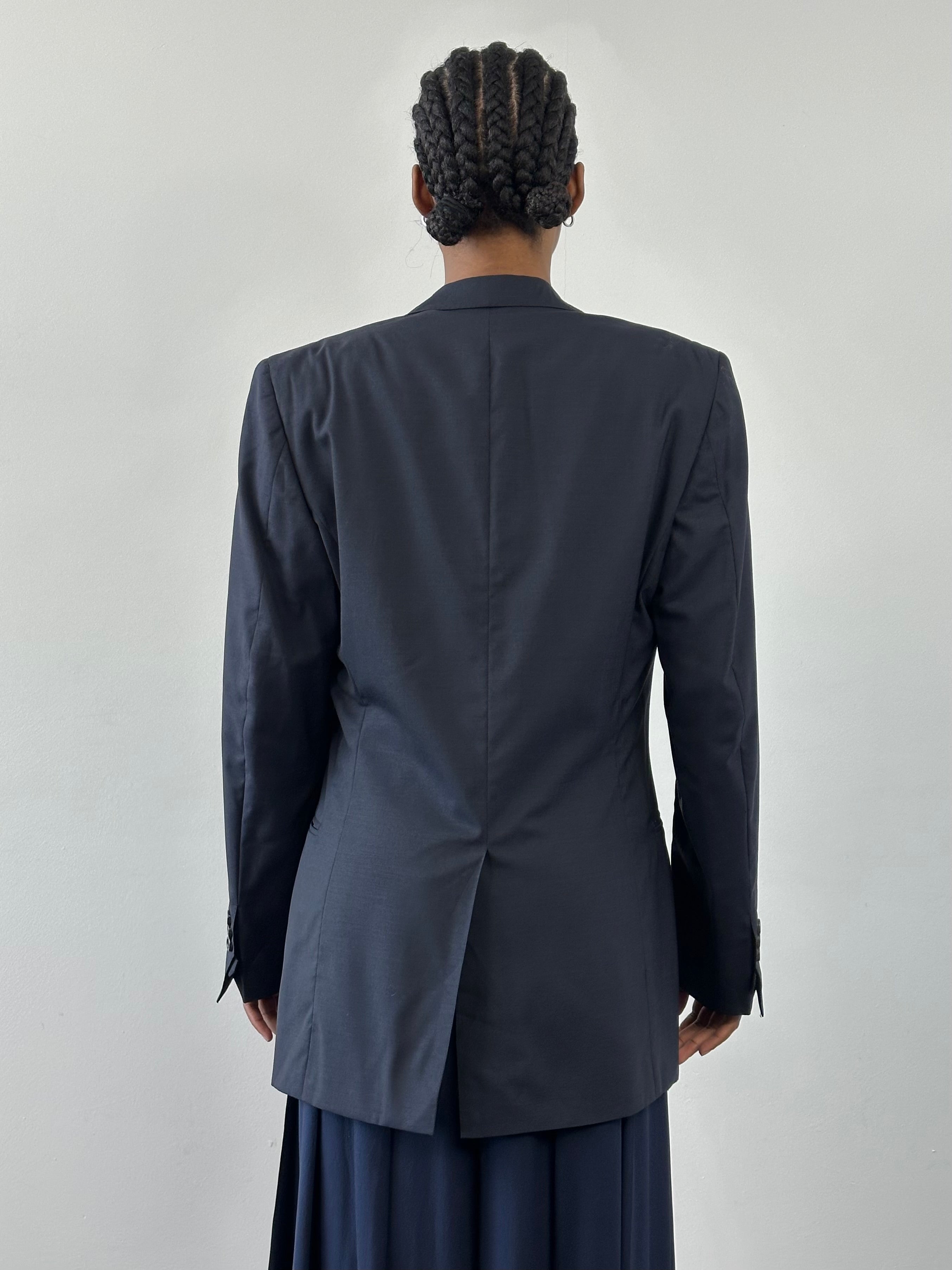 Yves Saint Laurent Rive Gauche 1990s pure wool blazer in size 36R/M, shown on a hanger with classic tailoring and structured fit.