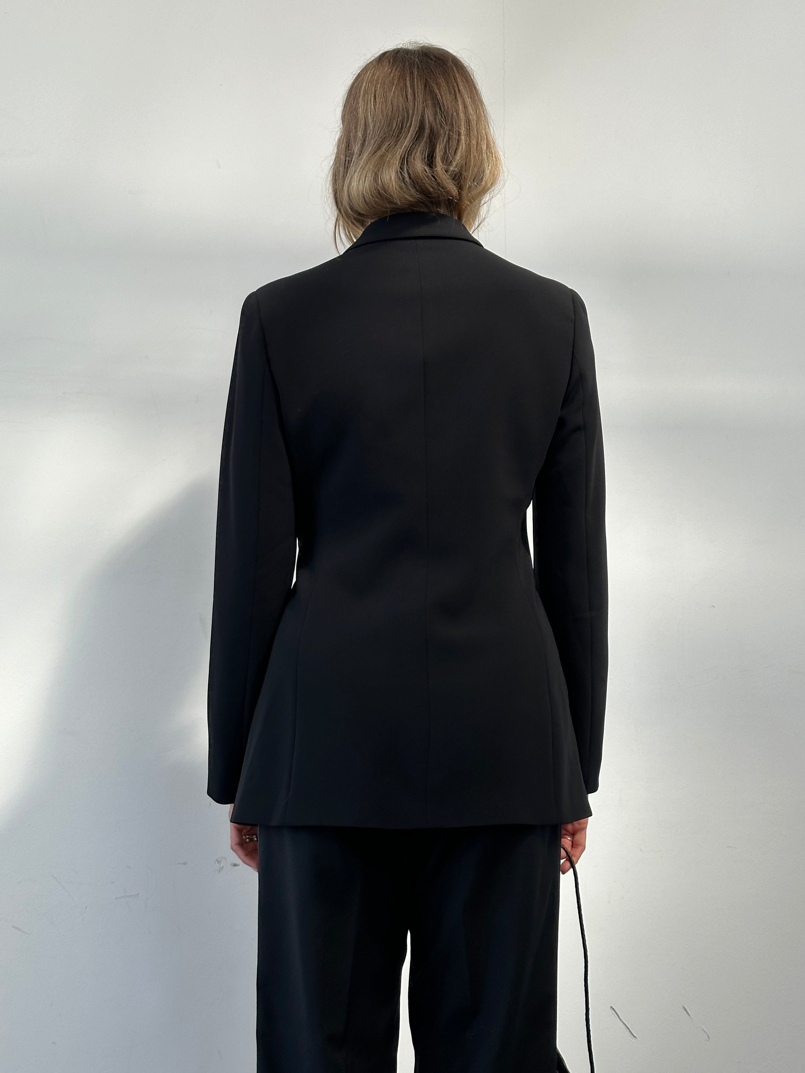 Max Mara tie side blazer in size M, tailored fit with stylish design, shown in a front view highlighting the blazer's details.