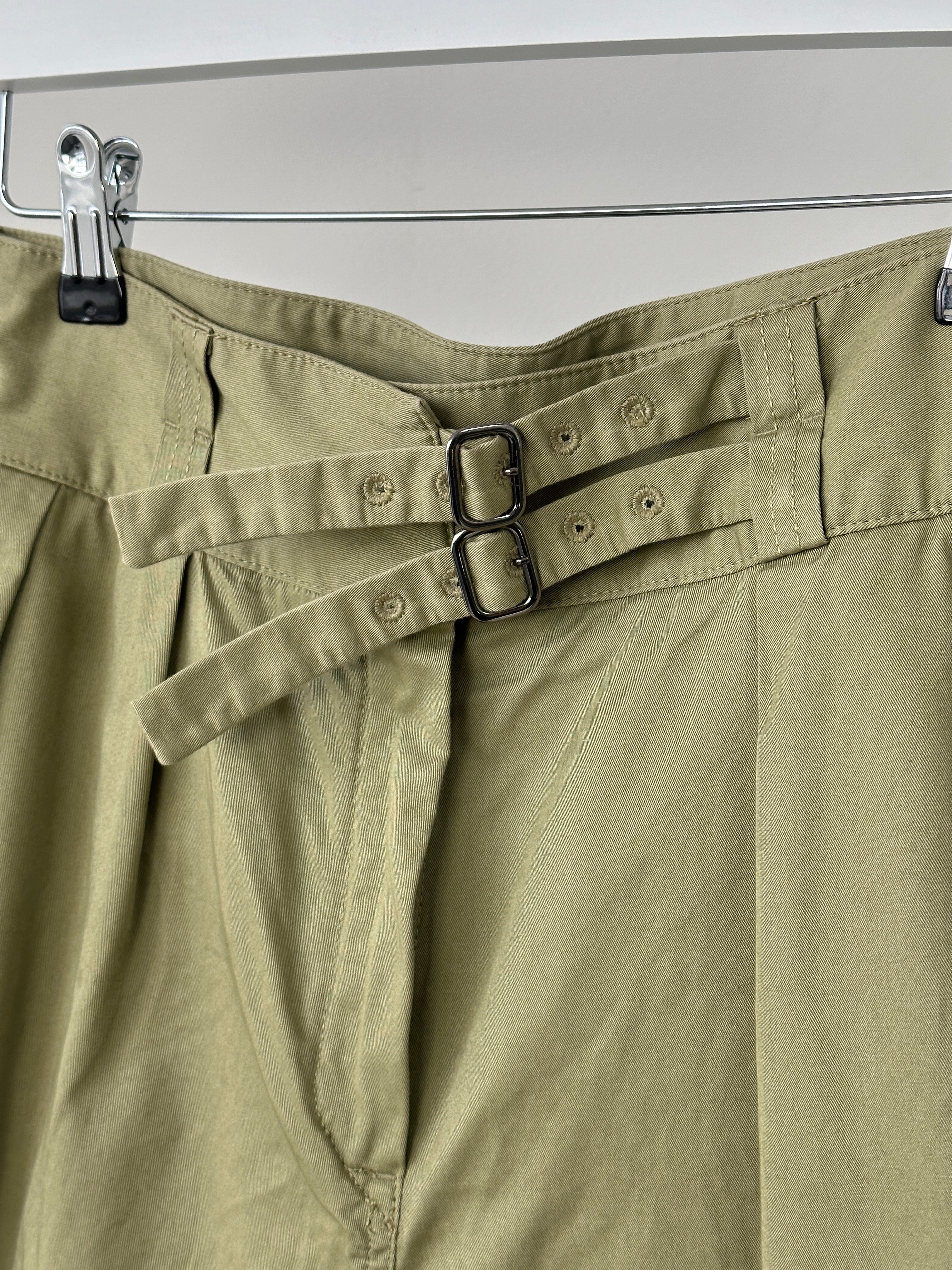 Lacoste high waisted pure cotton shorts in W28, light-colored with classic Lacoste logo, laid flat on a white background