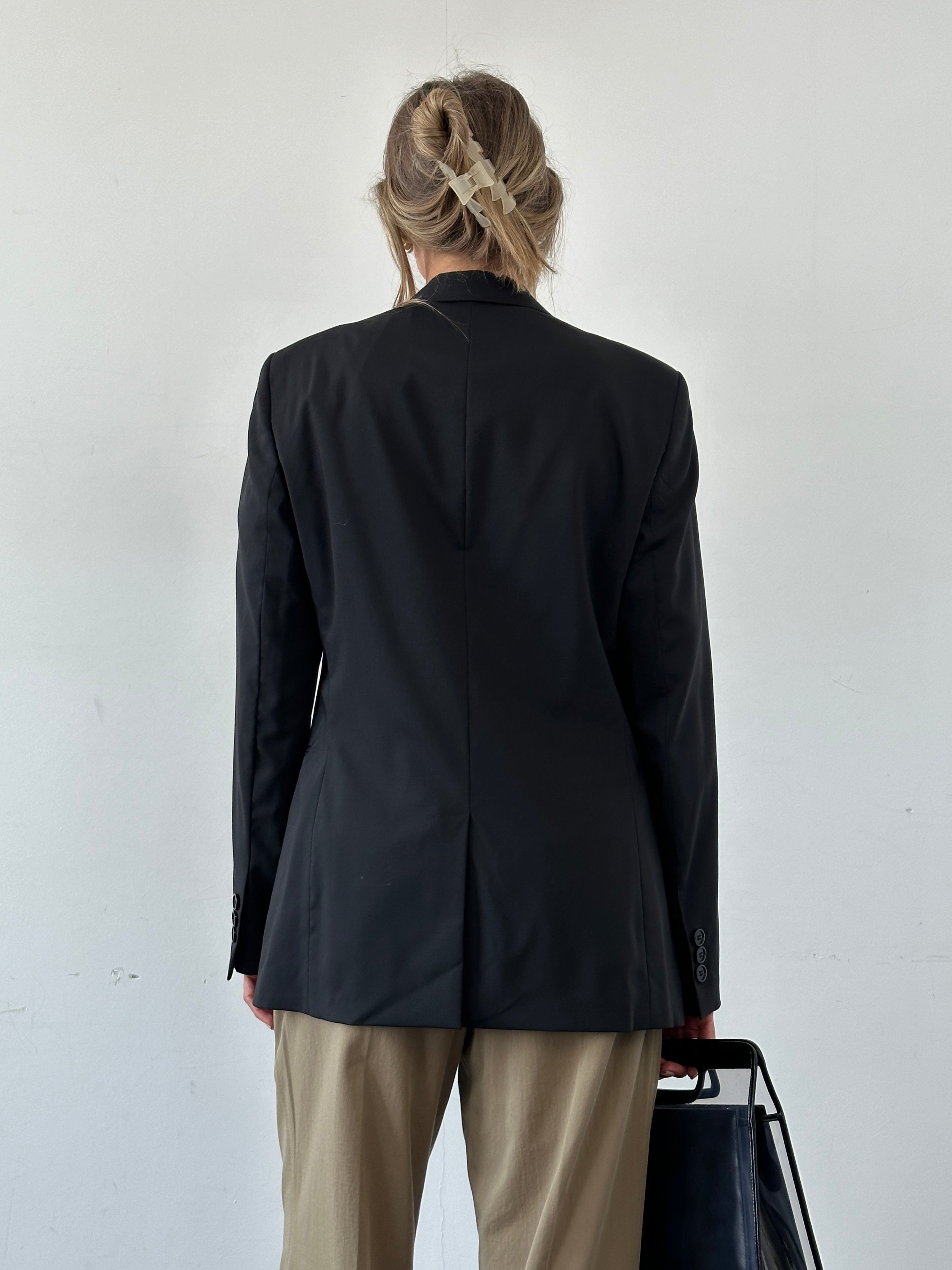 Emporio Armani virgin wool single-breasted blazer in size 38R/M, tailored fit with classic lapel and sleek design.