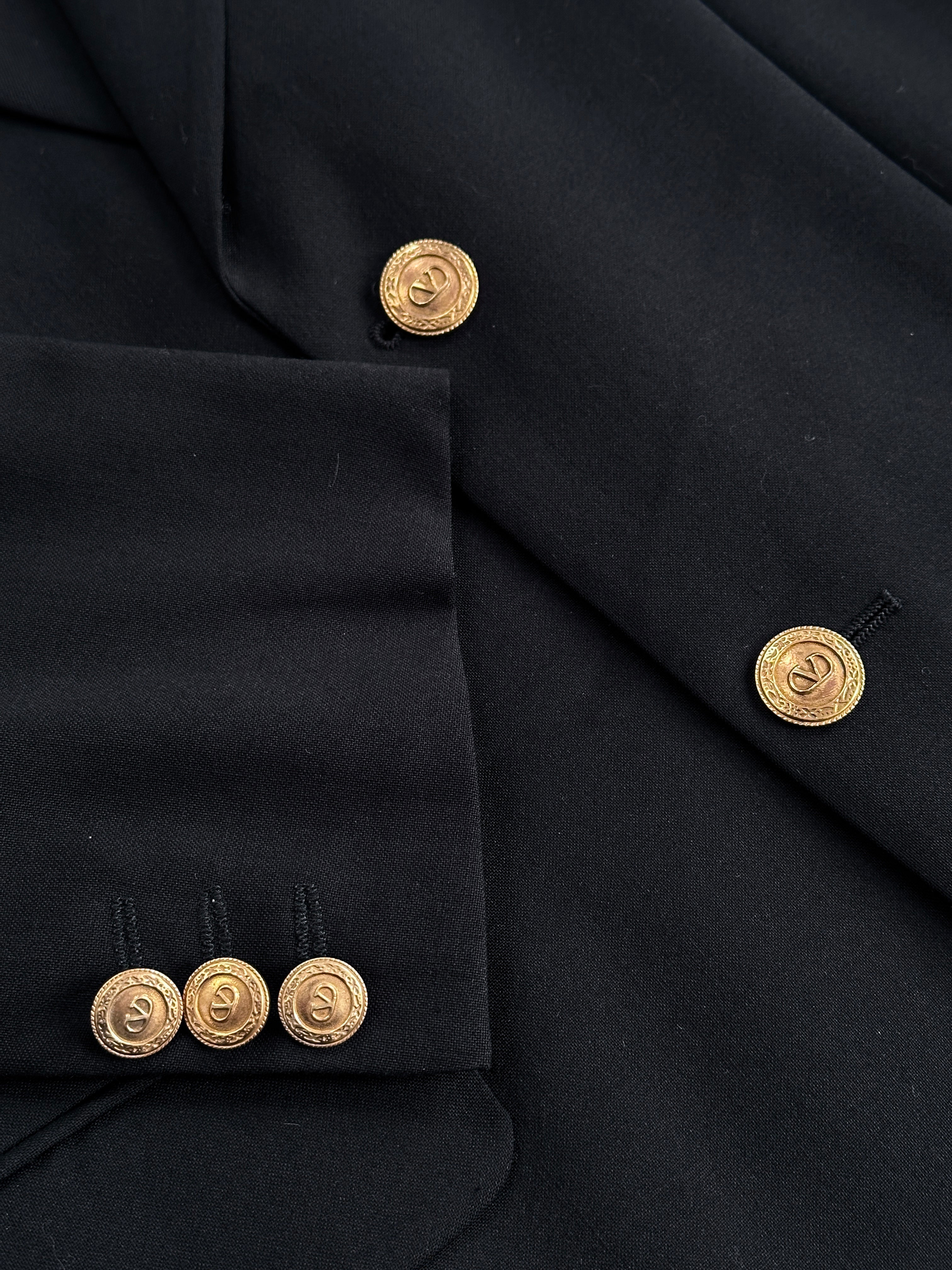 Valentino bespoke pure wool single-breasted blazer in size 36R/M, tailored fit with classic lapels and structured design.