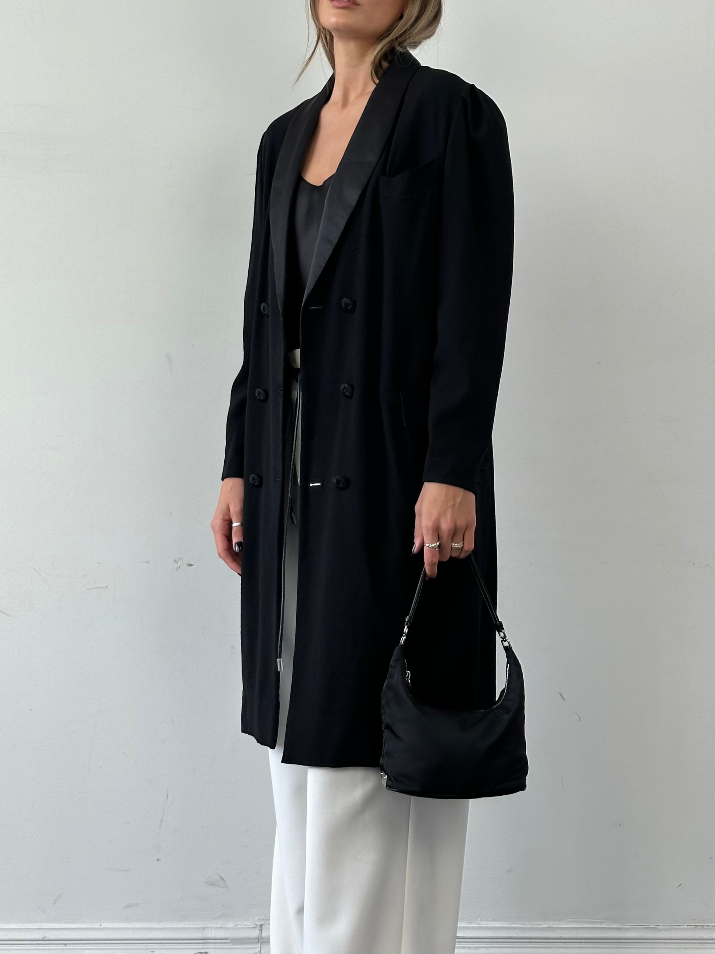 Jaeger lightweight double-breasted wool tuxedo coat in size M, shown on a hanger with classic tailored details.