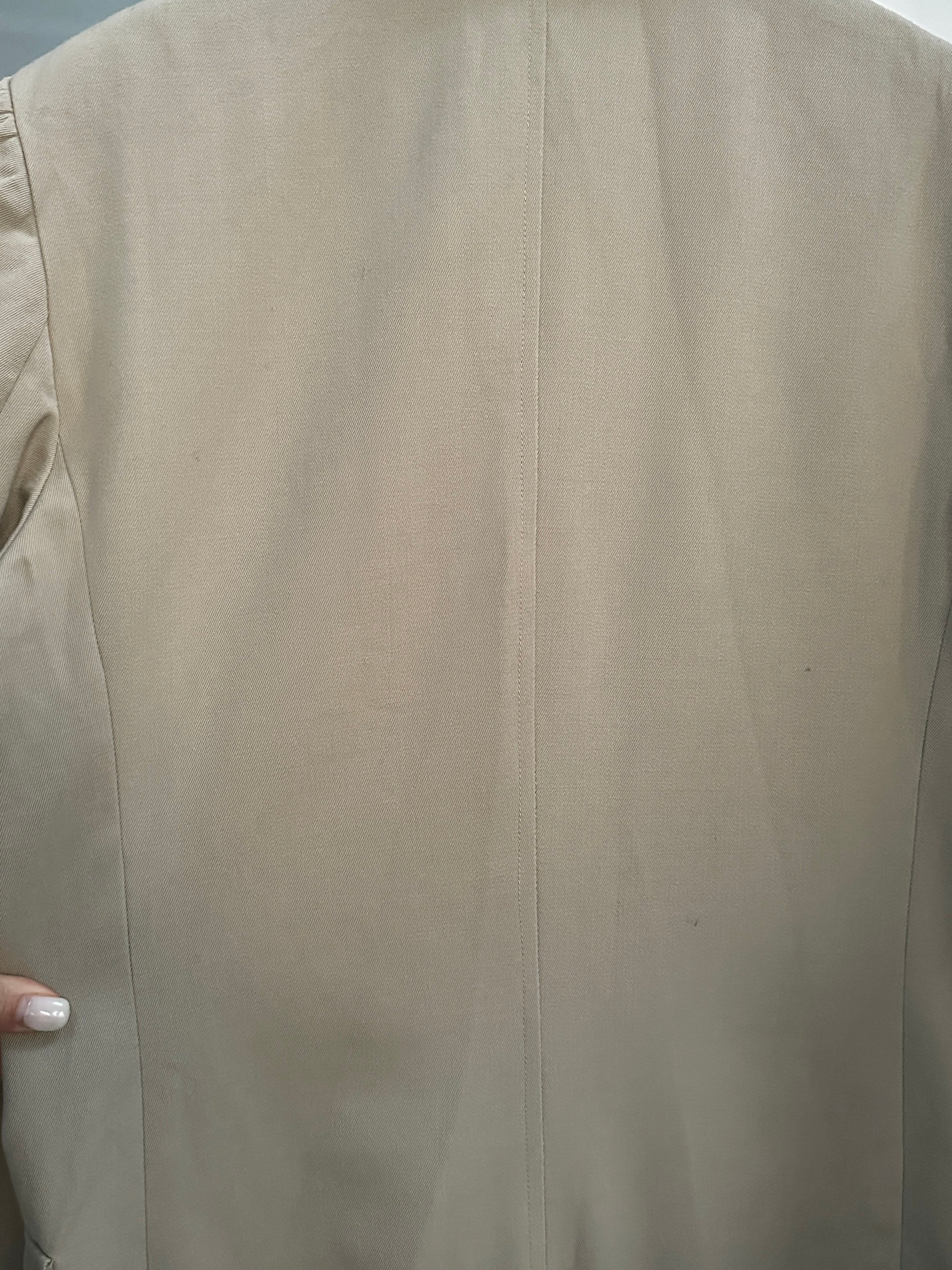 Vintage Italian double-breasted wool trench coat in classic style, featuring traditional design and natural wool fabric.