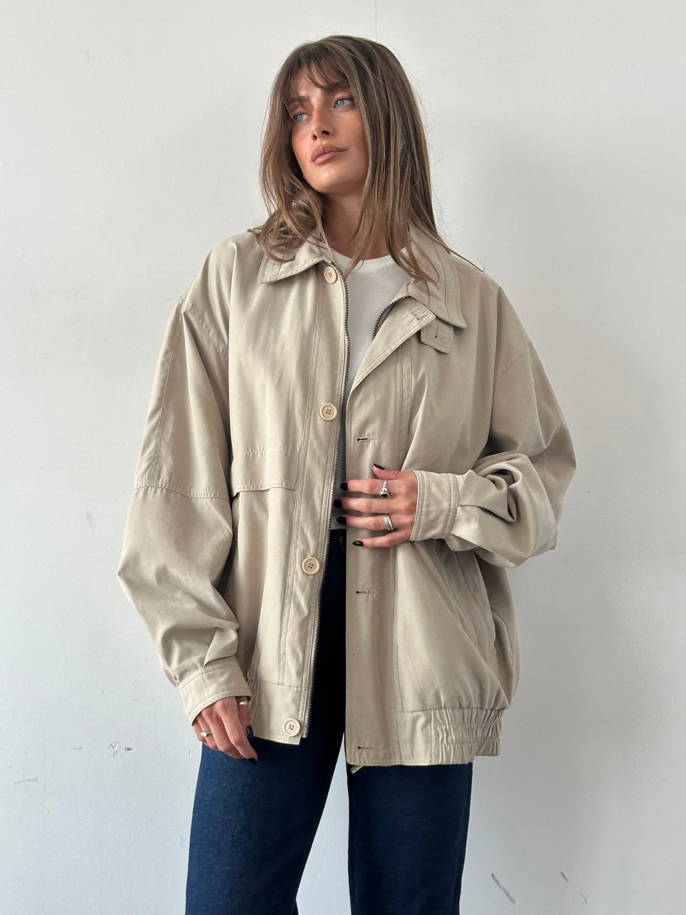 Vintage micro satin bomber jacket in XXL with ribbed cuffs and collar, featuring a sleek, shiny finish and classic style.