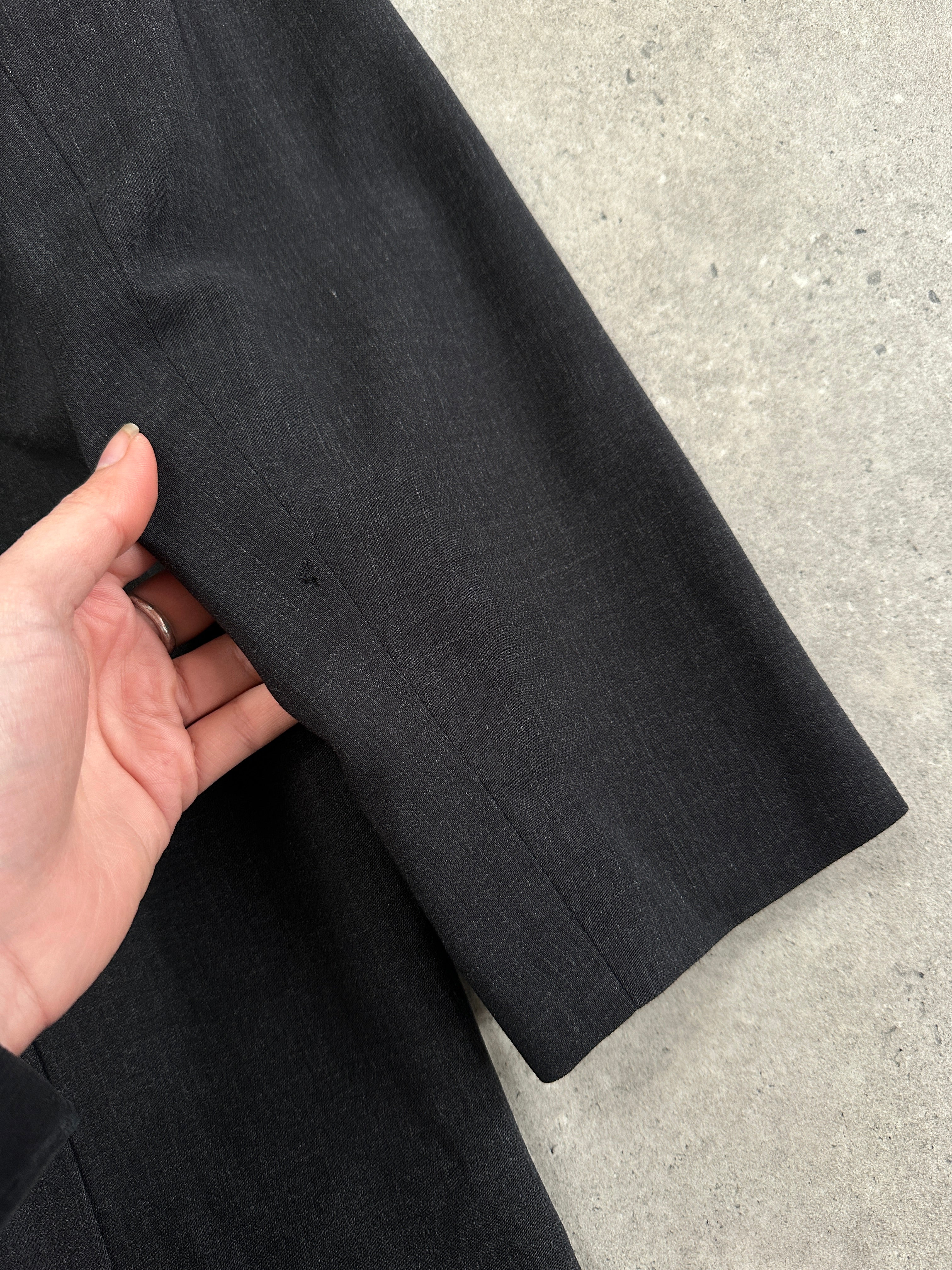 Jaeger 1990s pure wool two-piece skirt suit in classic design, featuring a tailored blazer and matching skirt.