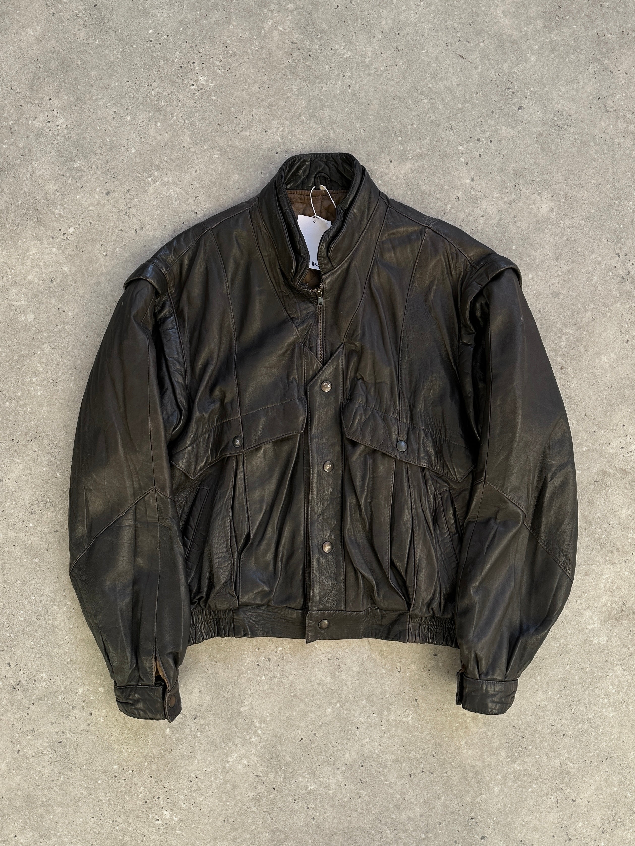 Vintage leather bomber gilet jacket in size M, featuring classic design and durable leather material.