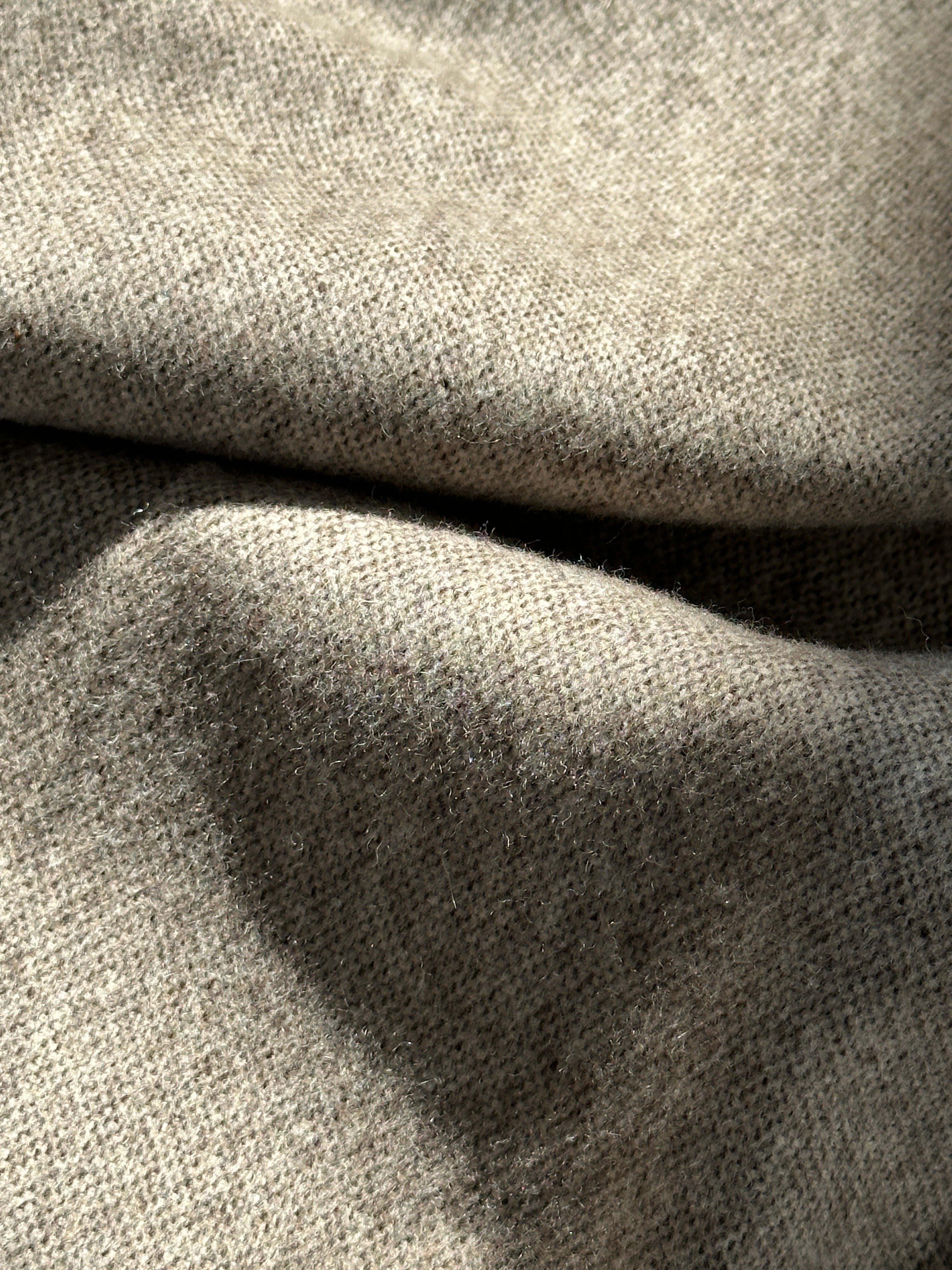 Max Mara wool wide-leg high-waisted trousers in neutral color, showcasing tailored fit and elegant design.
