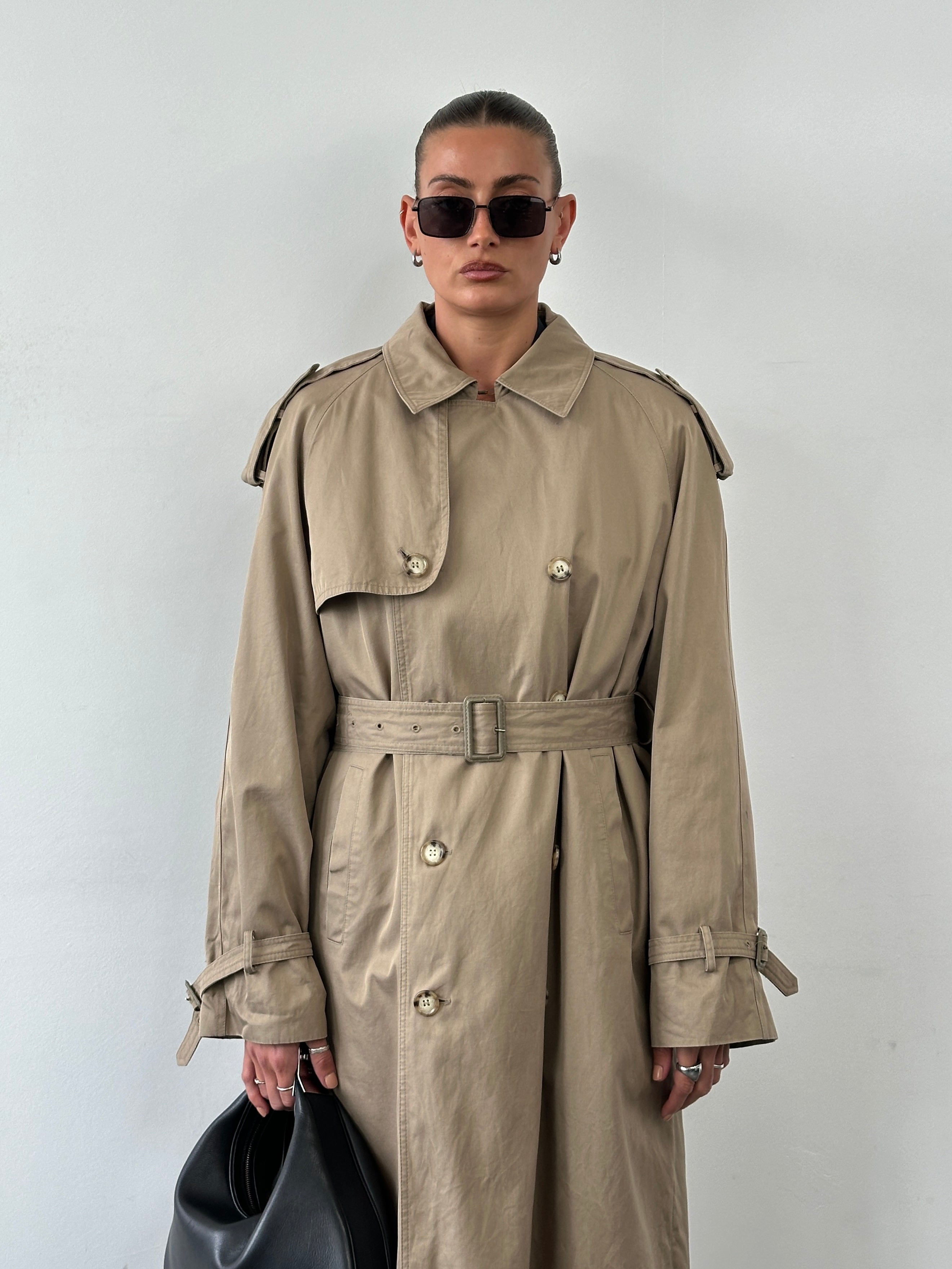 Yves Saint Laurent 80s pure cotton double-breasted belted trench coat in XL, beige color, shown on a hanger.