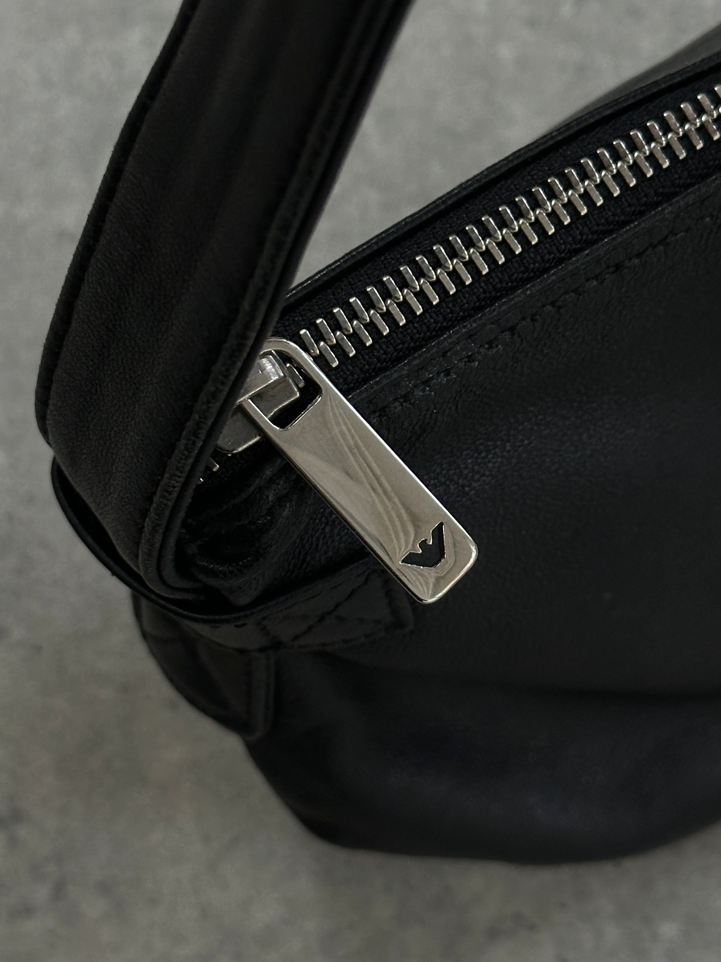 Emporio Armani leather shoulder bag with sleek design, featuring a smooth leather finish and adjustable strap.