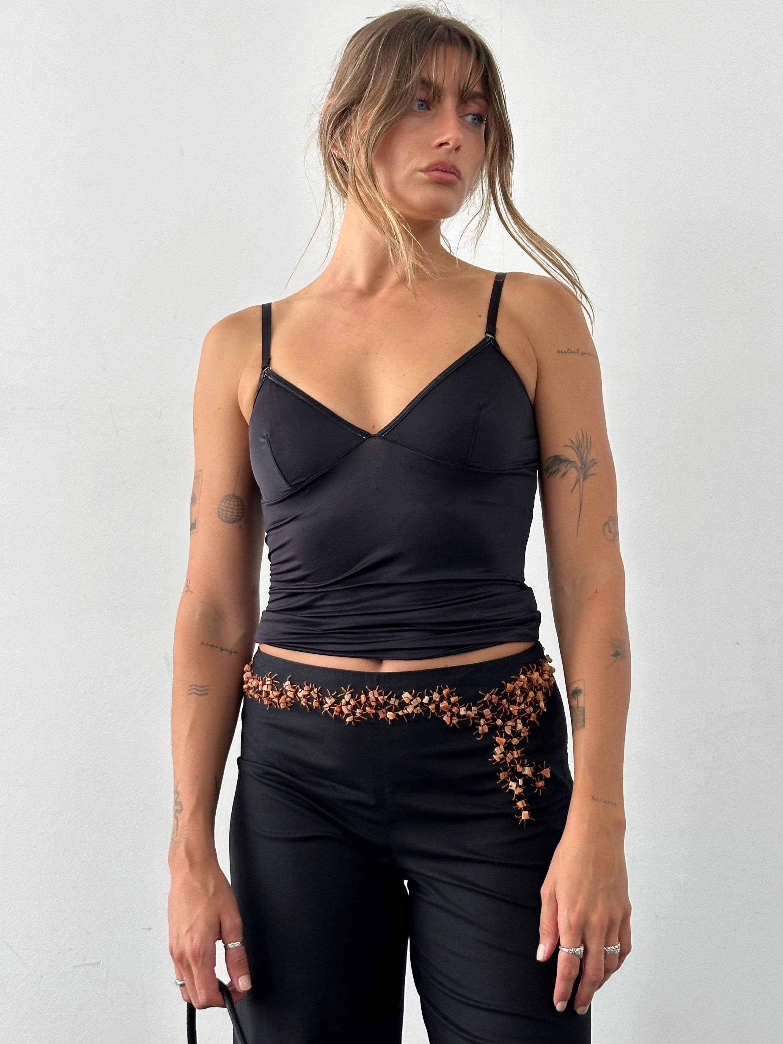 Vintage Alberta Ferretti mid waist wide-leg stone trousers with embellished details, showcasing elegant fabric and stylish fit.