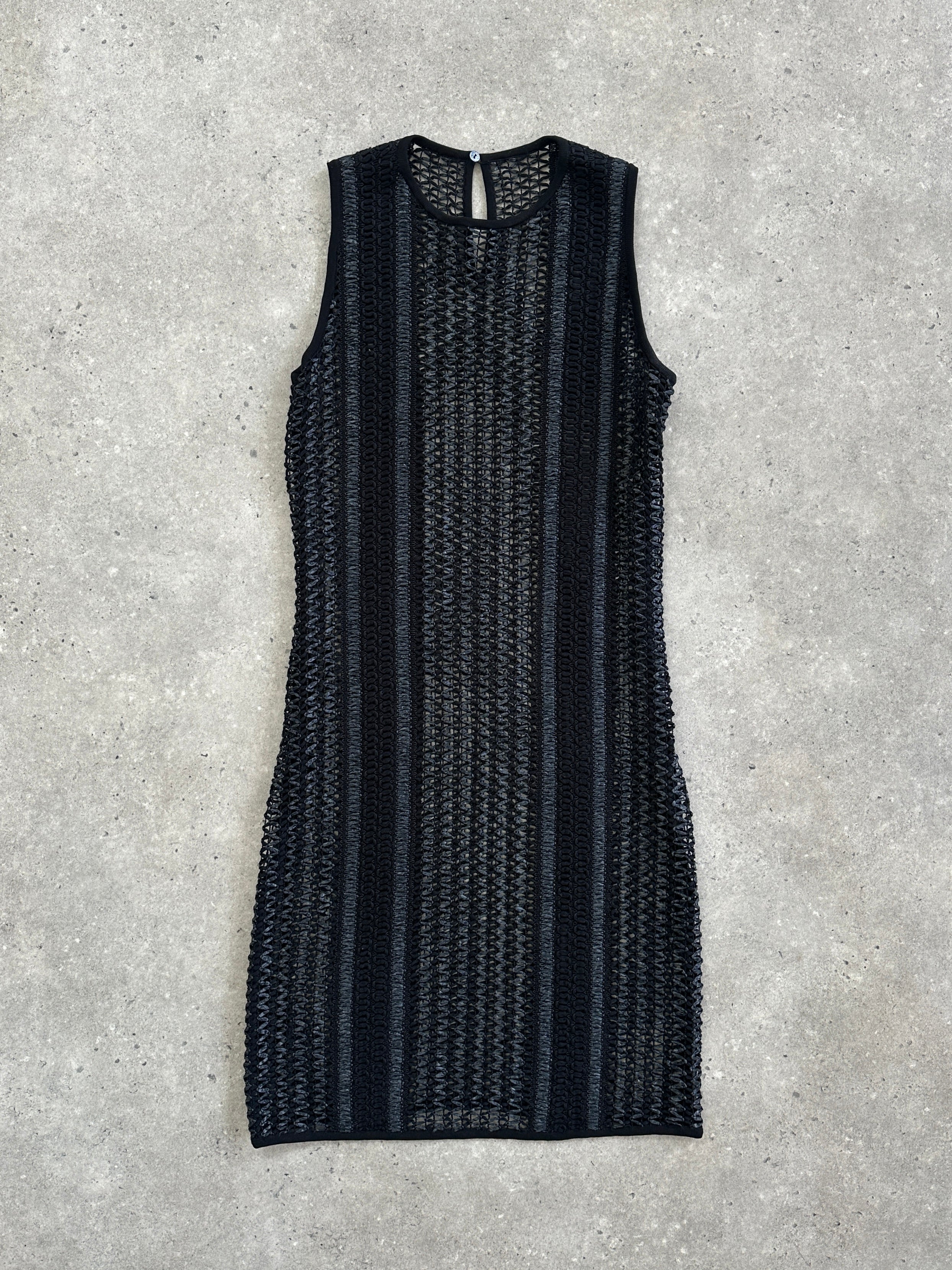 Vintage rattan crochet mini dress in S/M size, featuring intricate woven details and a stylish, bohemian-inspired design.