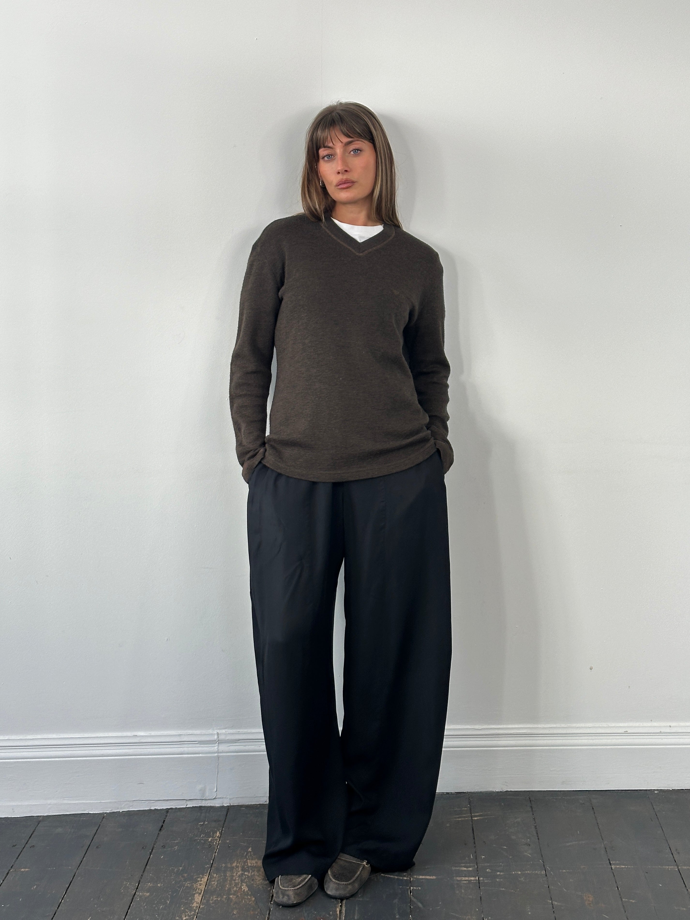 Armani Jeans 2000s wool V-neck knitted jumper in gray with logo detail, size M, featuring ribbed collar and cuffs.