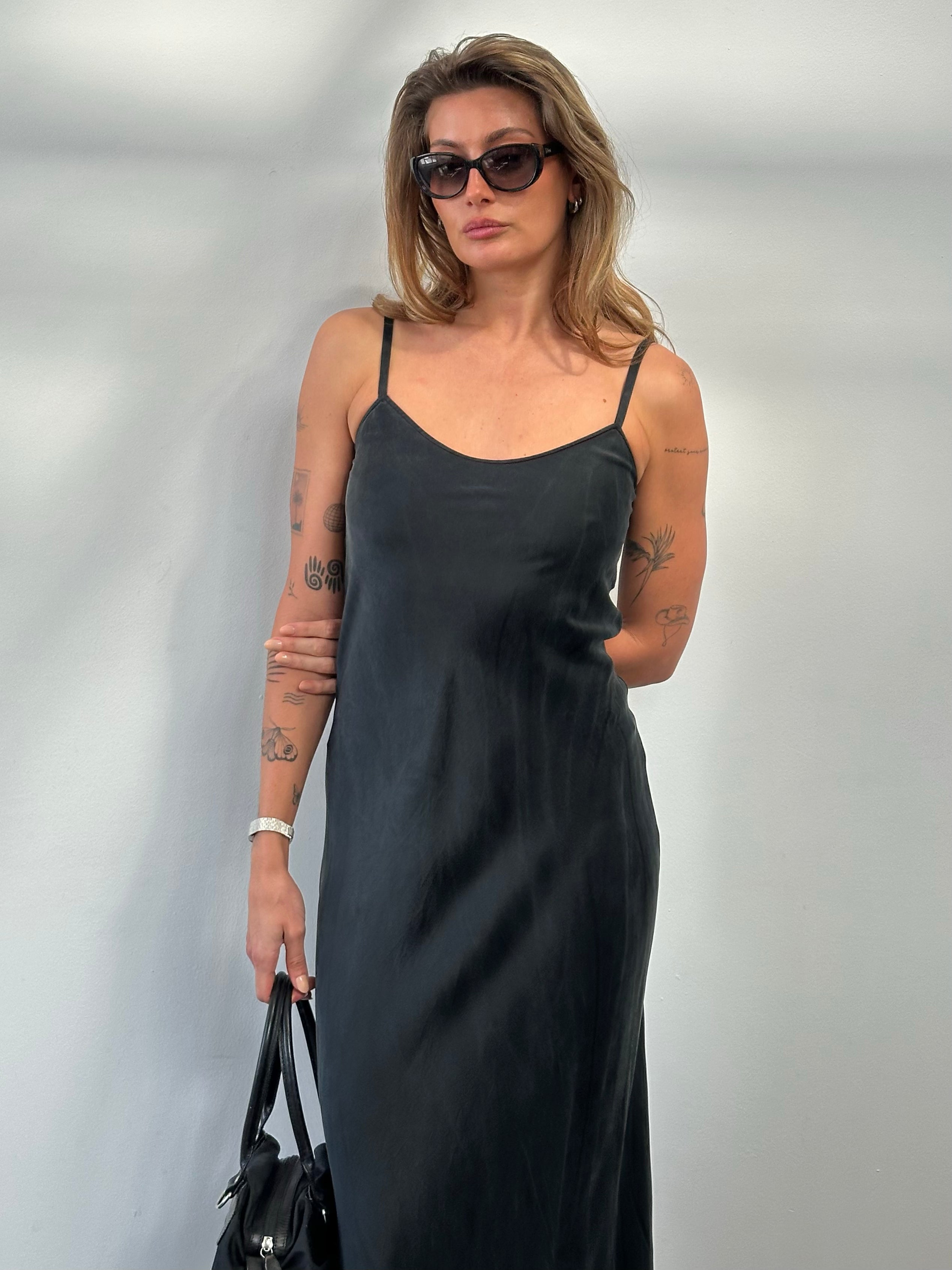 Vintage 1990s pure silk floor length slip dress, size small, featuring a sleek, elegant design and soft fabric in a classic style.