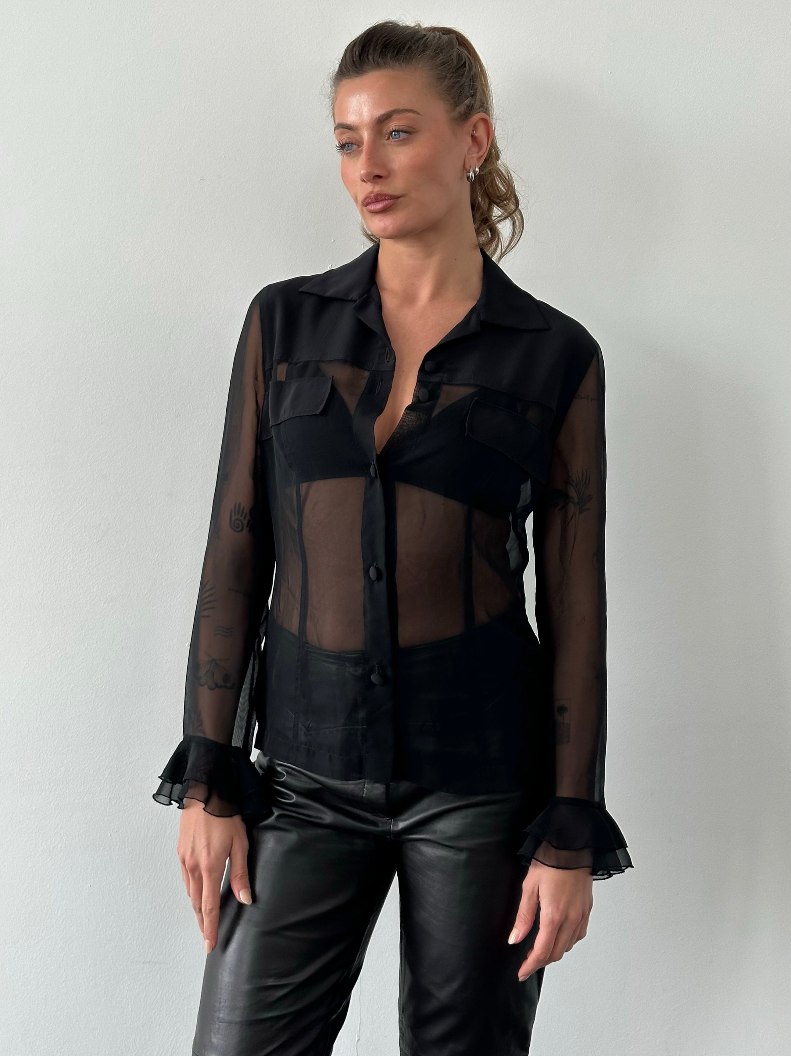 Vintage 1990s ruffle sleeve sheer shirt, medium size, featuring lightweight fabric and feminine design.